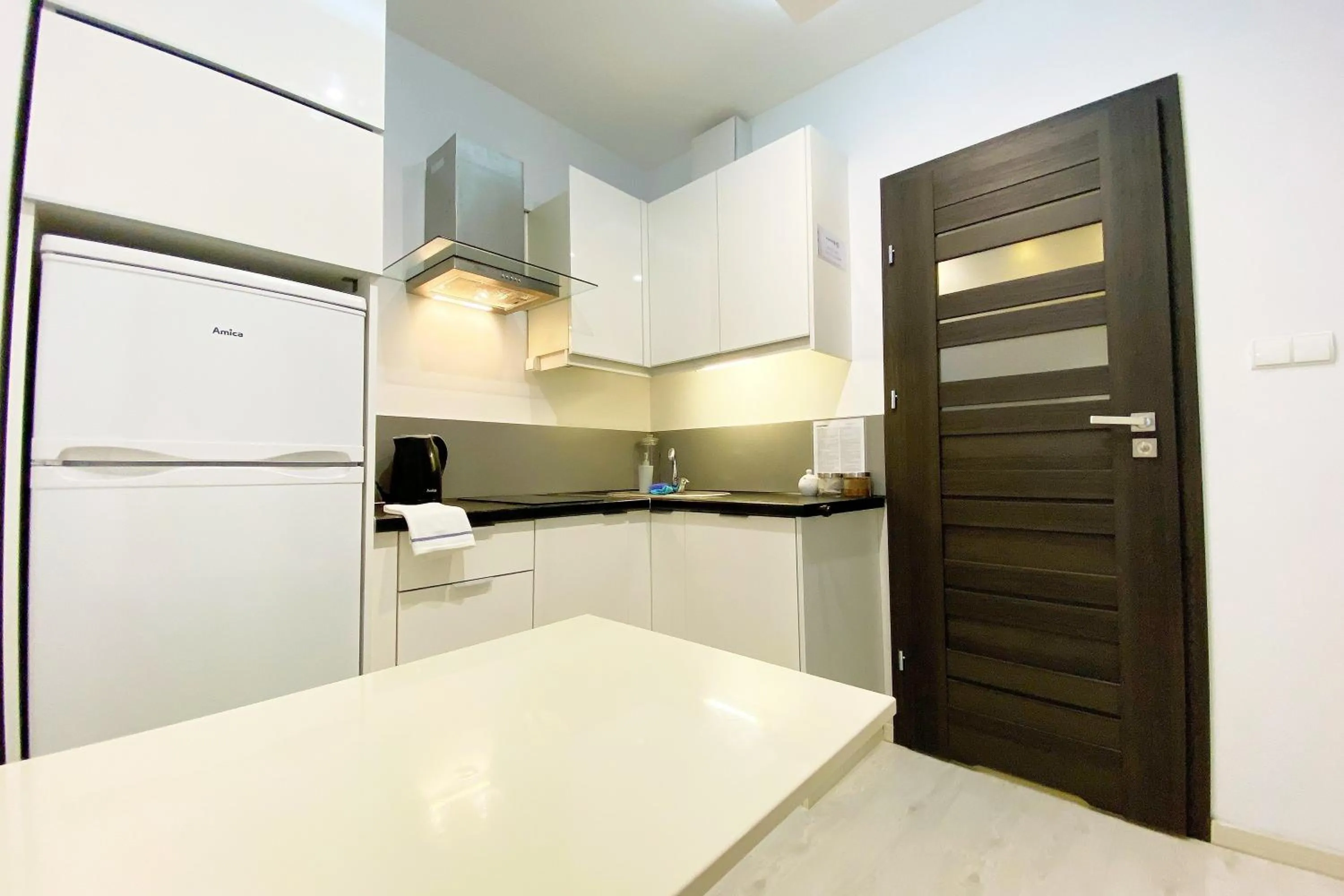 Kitchen or kitchenette in erApartments Oxygen Residence