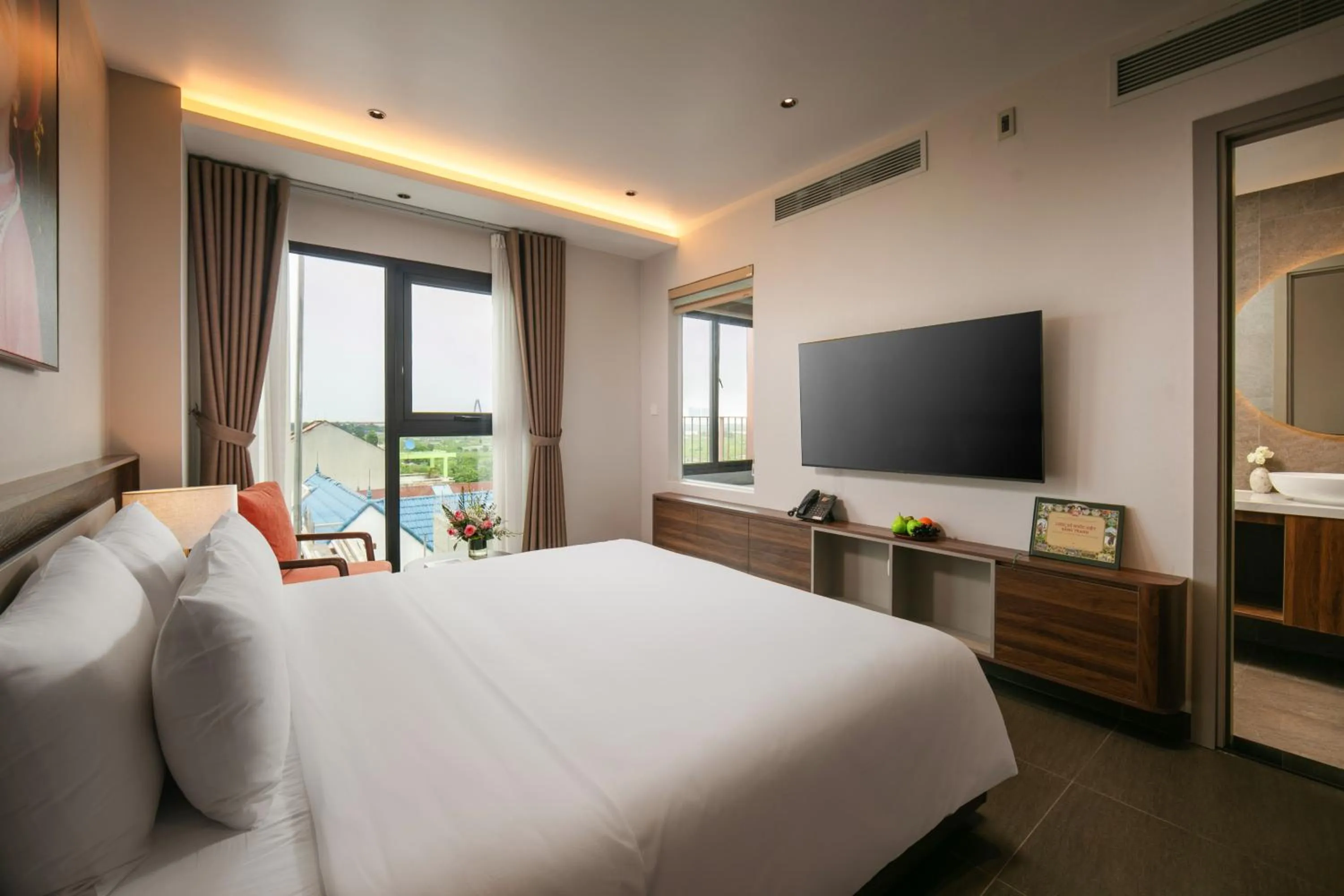 Communal lounge/ TV room, Bed in Hanoi Riverview Boutique Hotel & Apartment