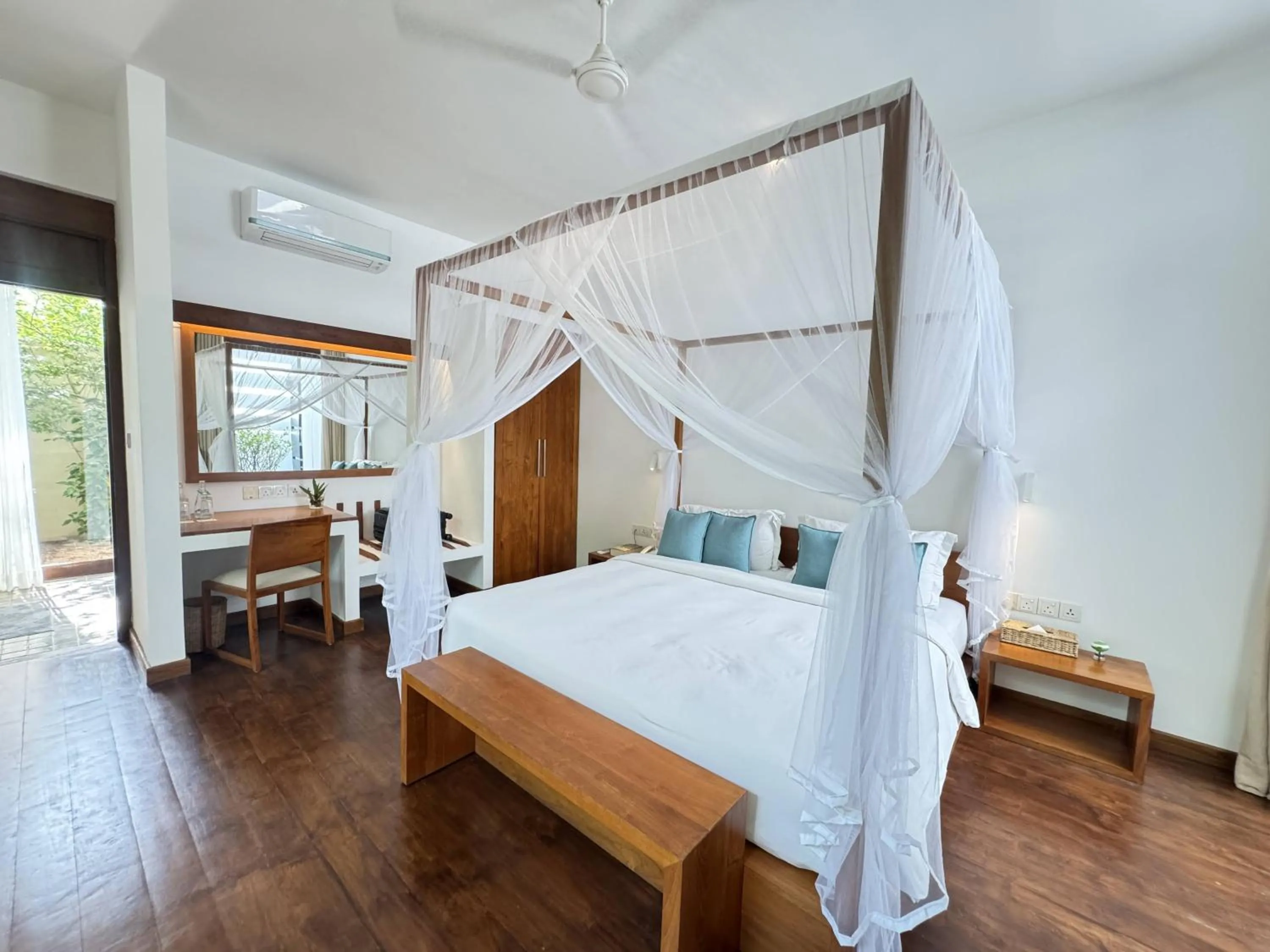 Bed in Calamansi Cove Villas