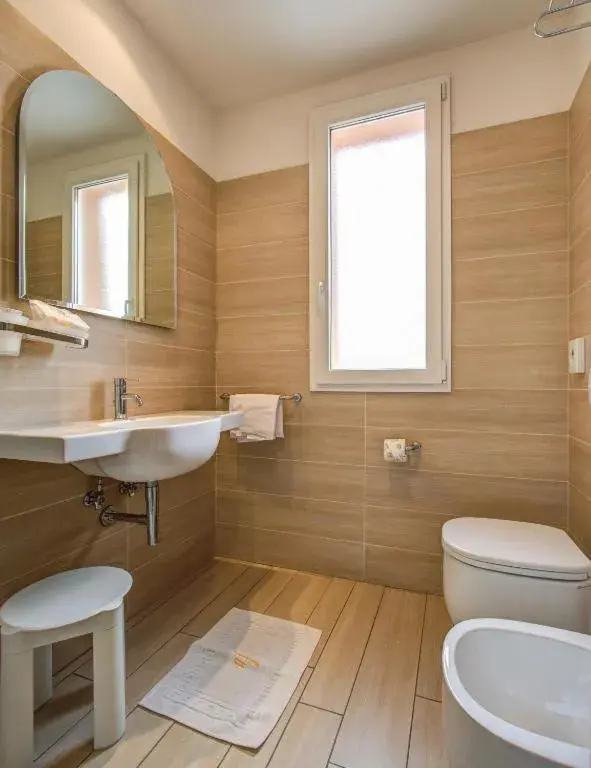 Triple Room in Hotel Fiamma & SPA Cesenatico Triple Room in Hotel Fiamma & SPA Cesenatico