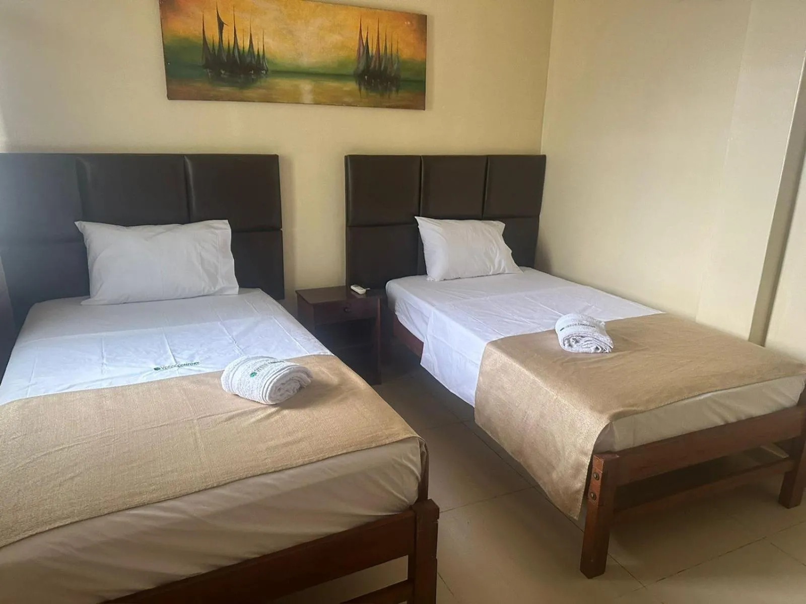 Photo of the whole room, Bed in Doral Inn Hotel - Iquitos