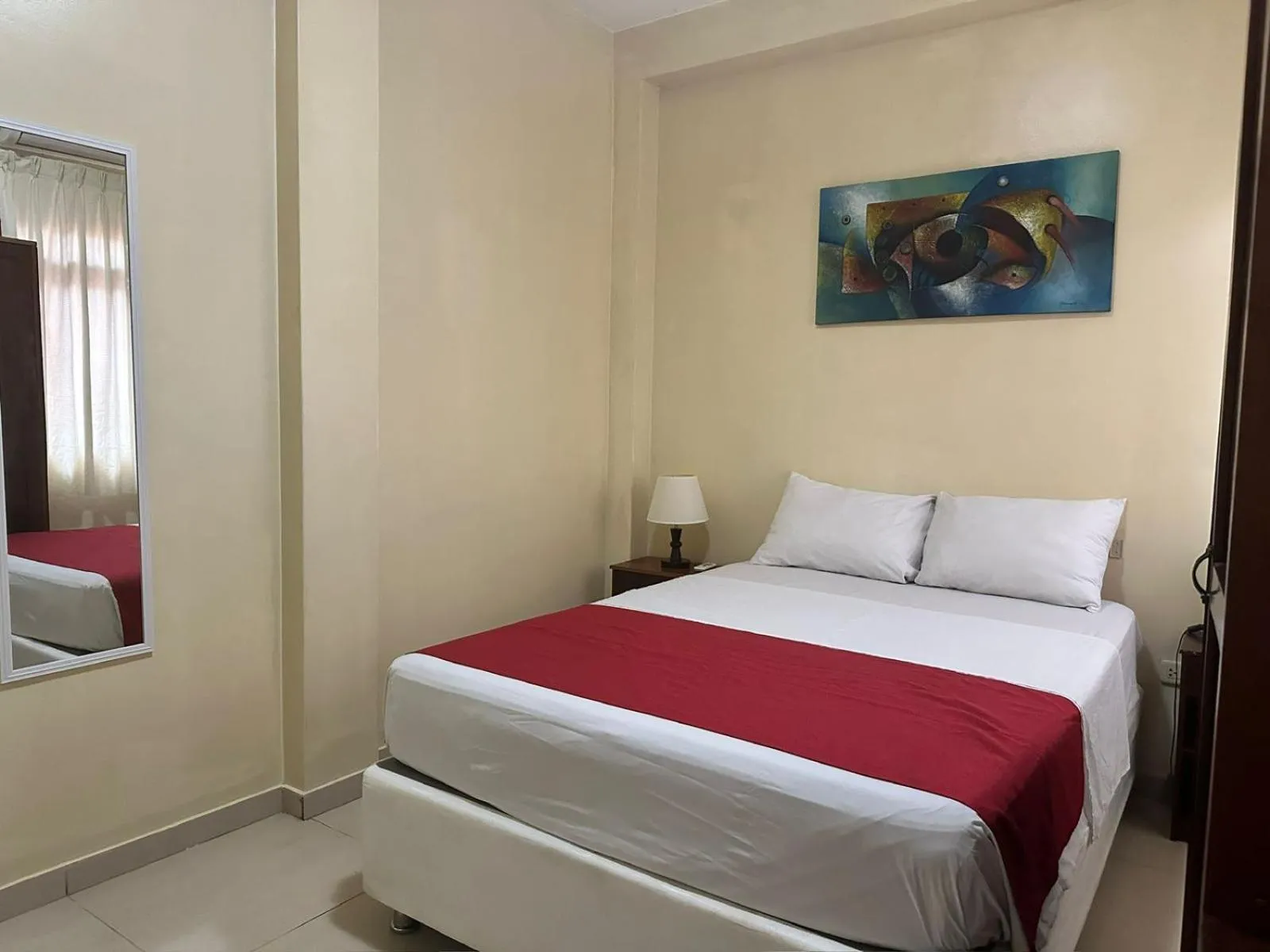 Photo of the whole room, Bed in Doral Inn Hotel - Iquitos