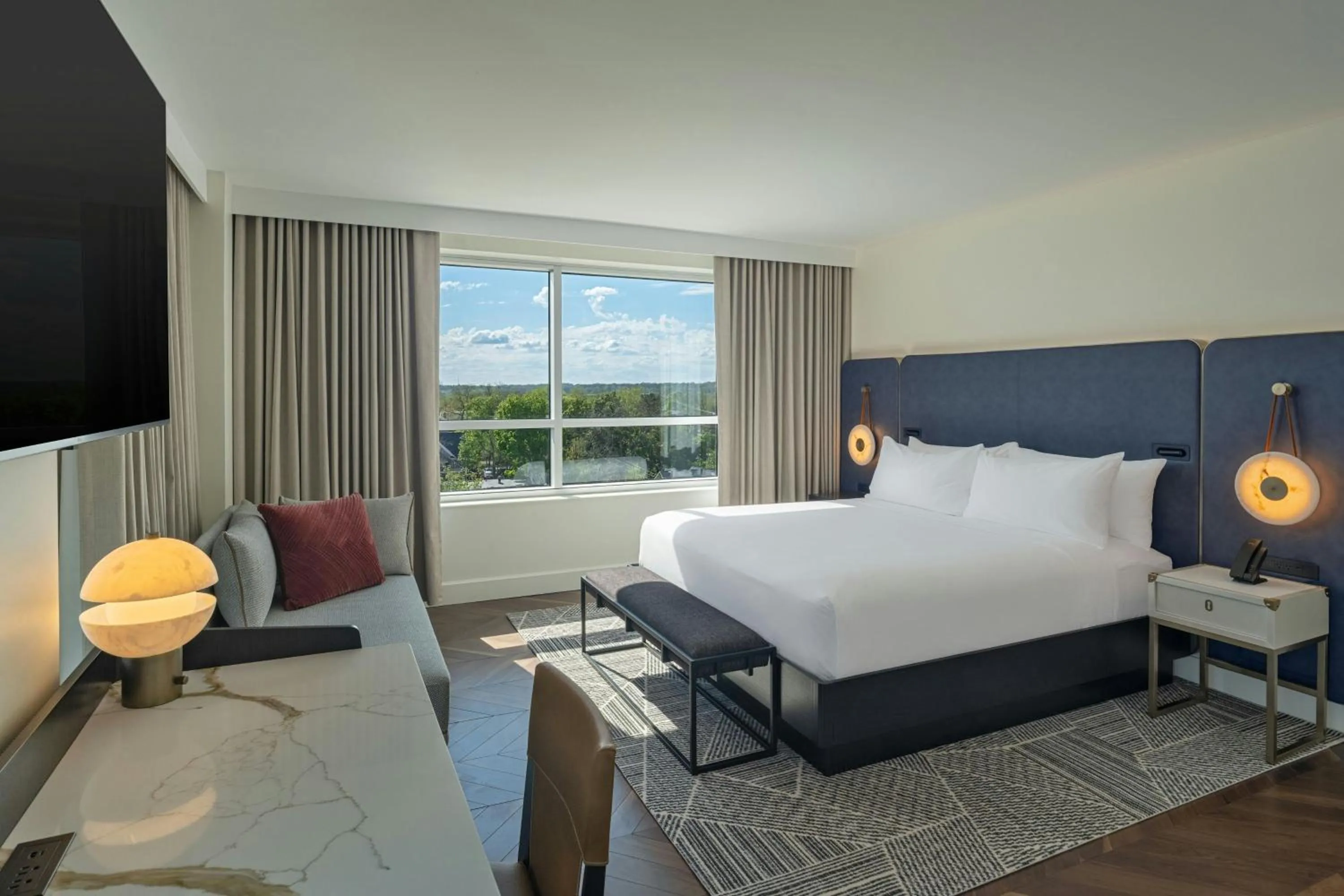 Photo of the whole room, Bed in The Vanguard Ann Arbor, Autograph Collection