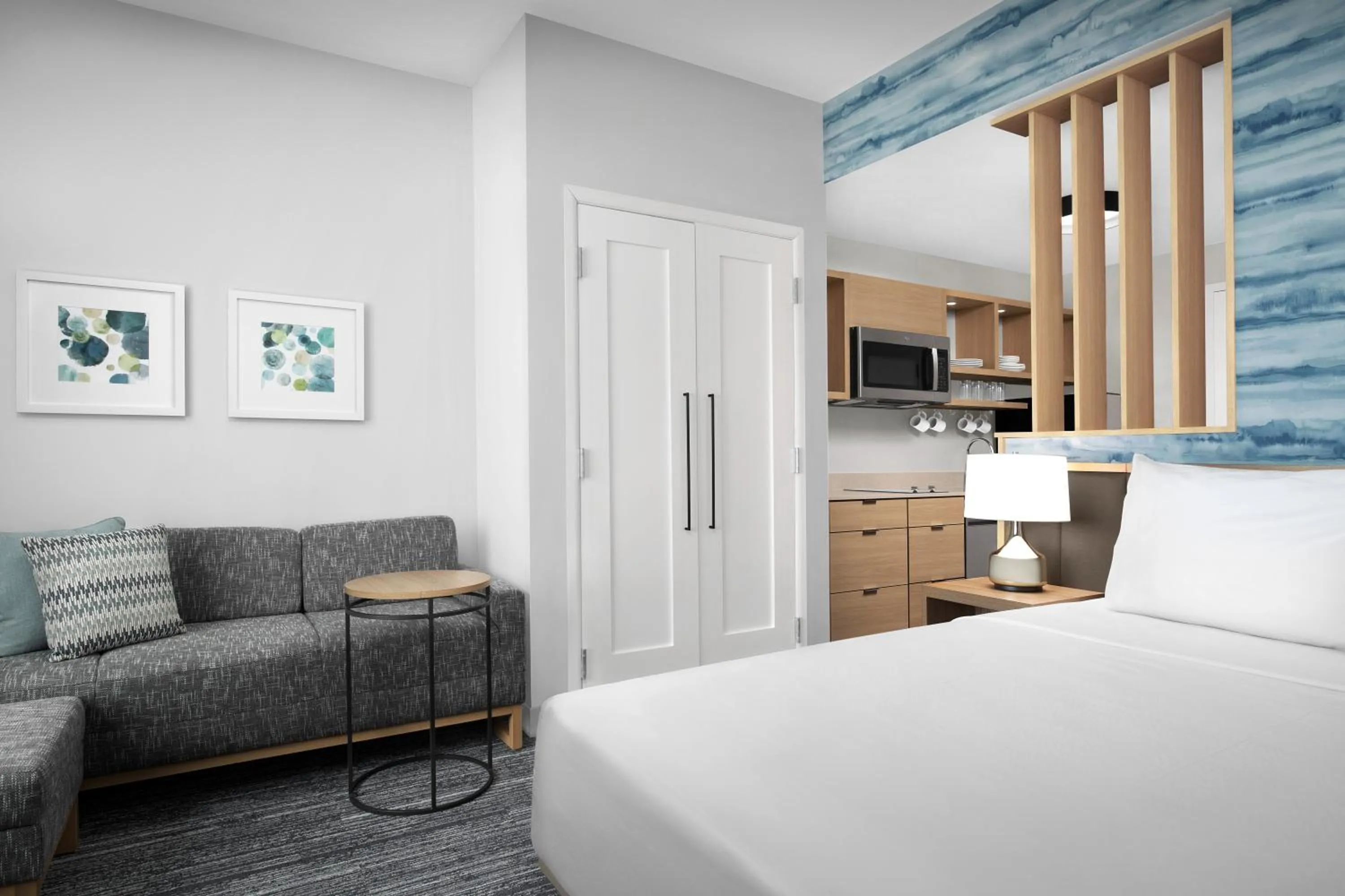 Kitchen or kitchenette, Bed in TownePlace Suites By Marriott Lake City