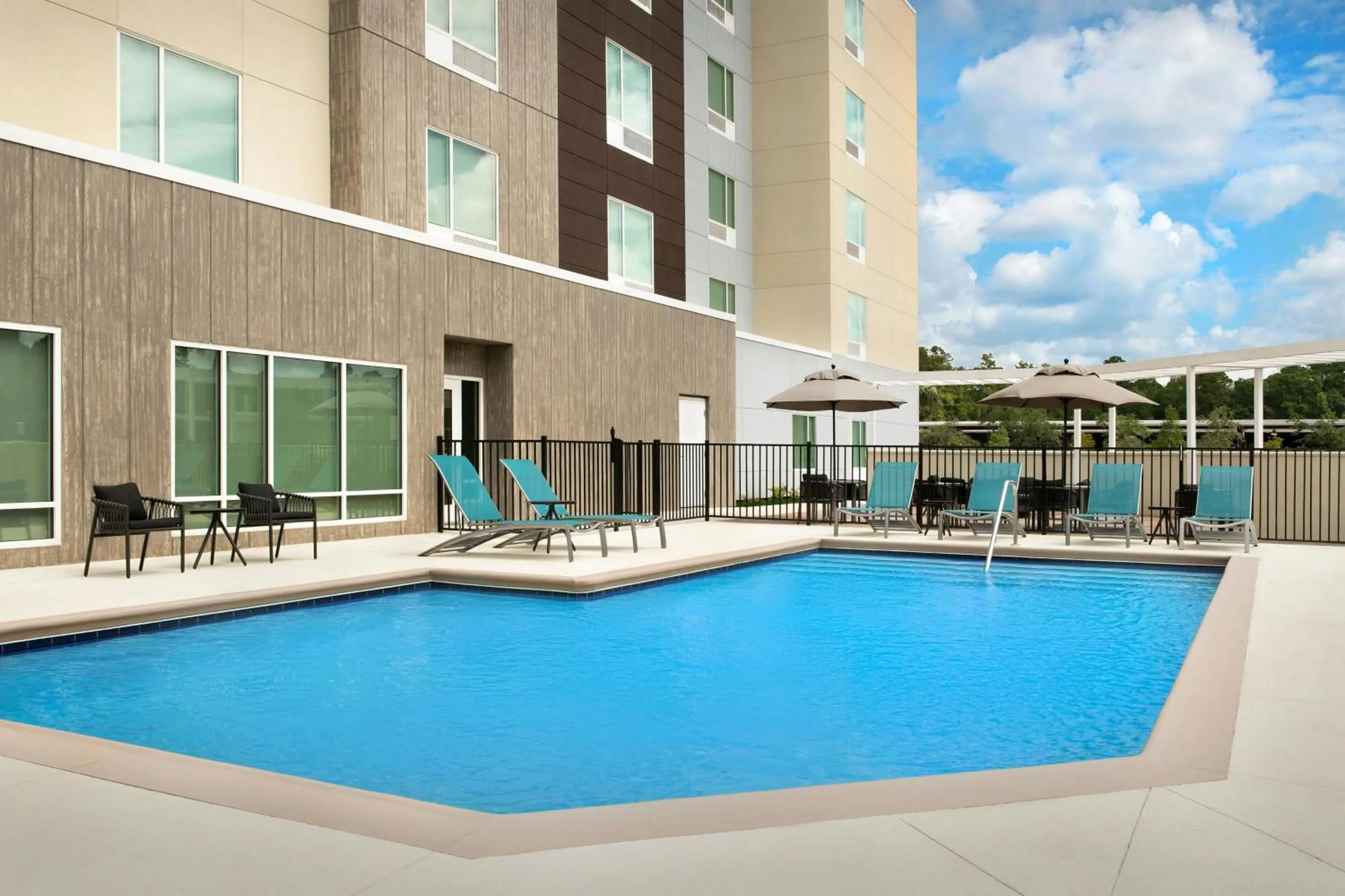 Swimming pool in TownePlace Suites By Marriott Lake City