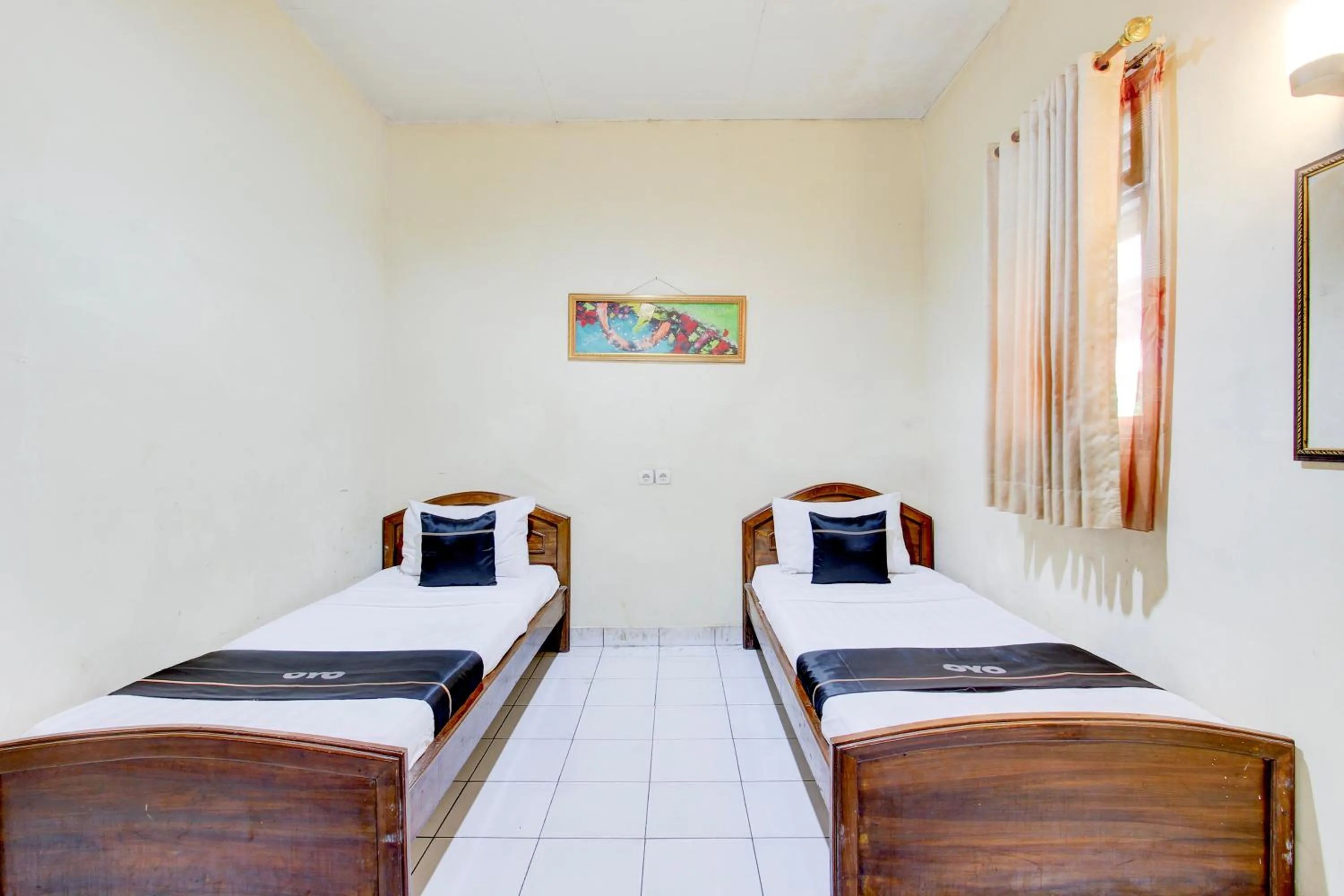 Photo of the whole room, Bed in Collection O Stasiun Pekalongan Near Stasiun Kereta Api Formerly Hotel Indah