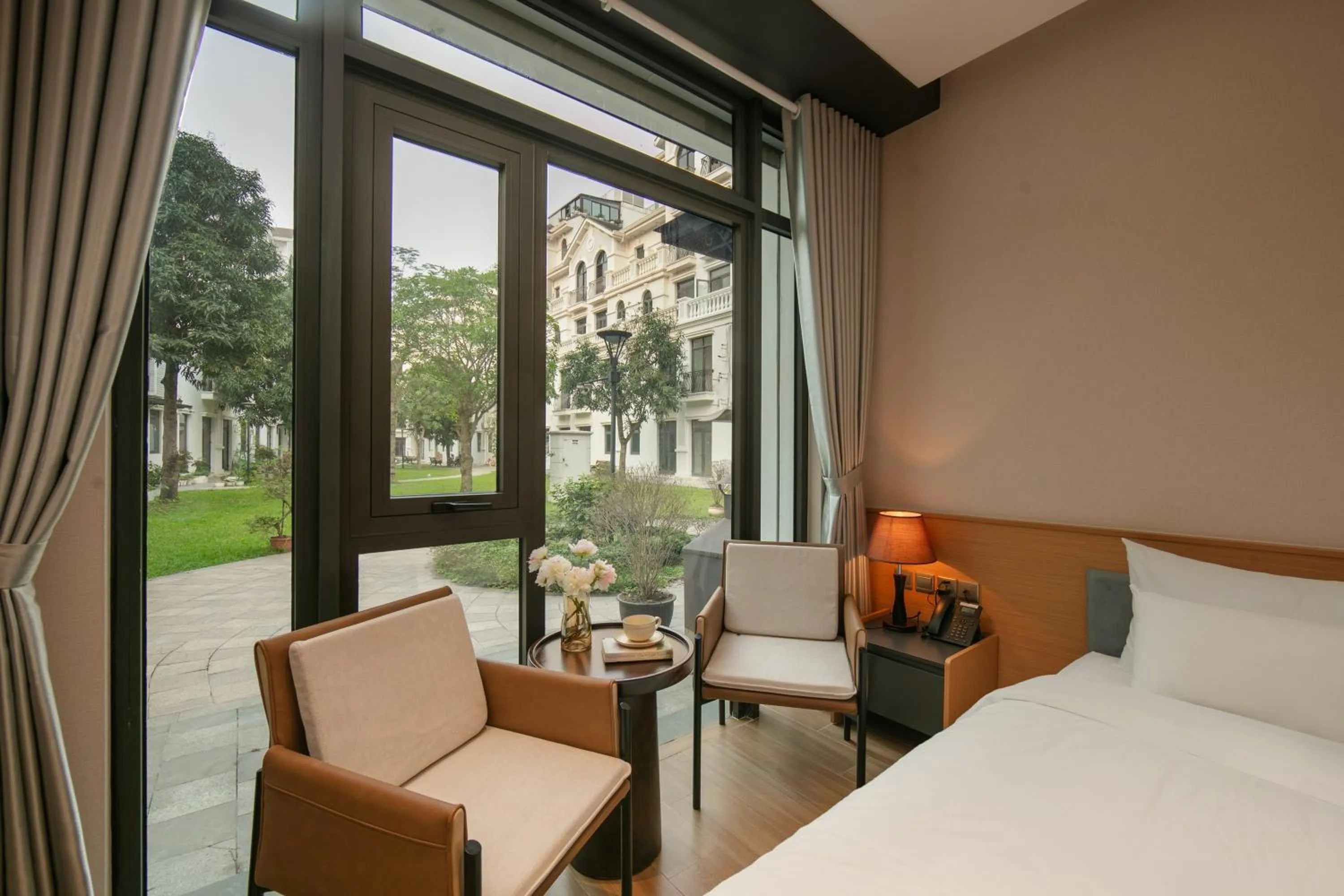 Garden view, Bed in PCA HOTEL 1 - Vinhomes Ocean Park