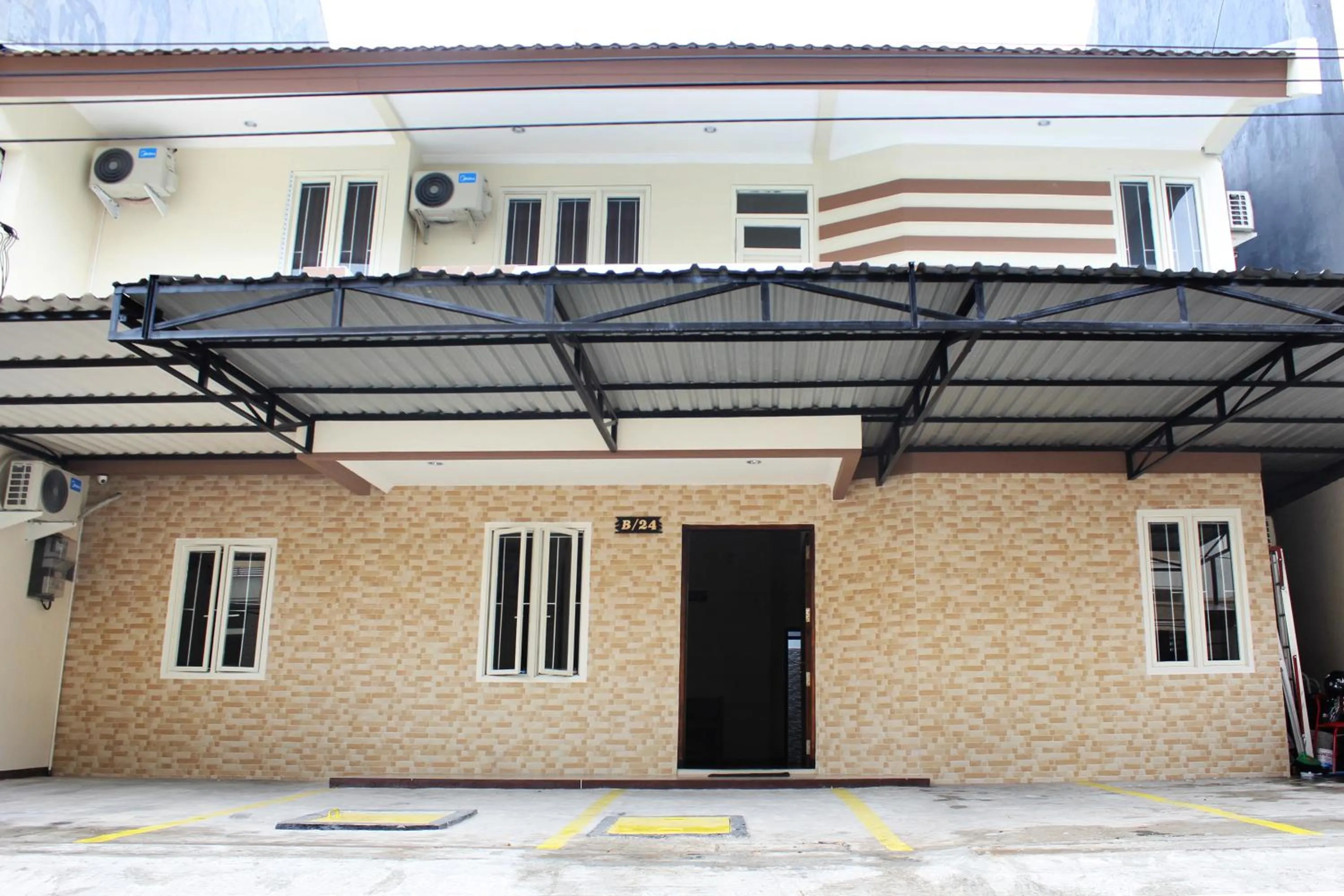 Property building in House of Dharmawan