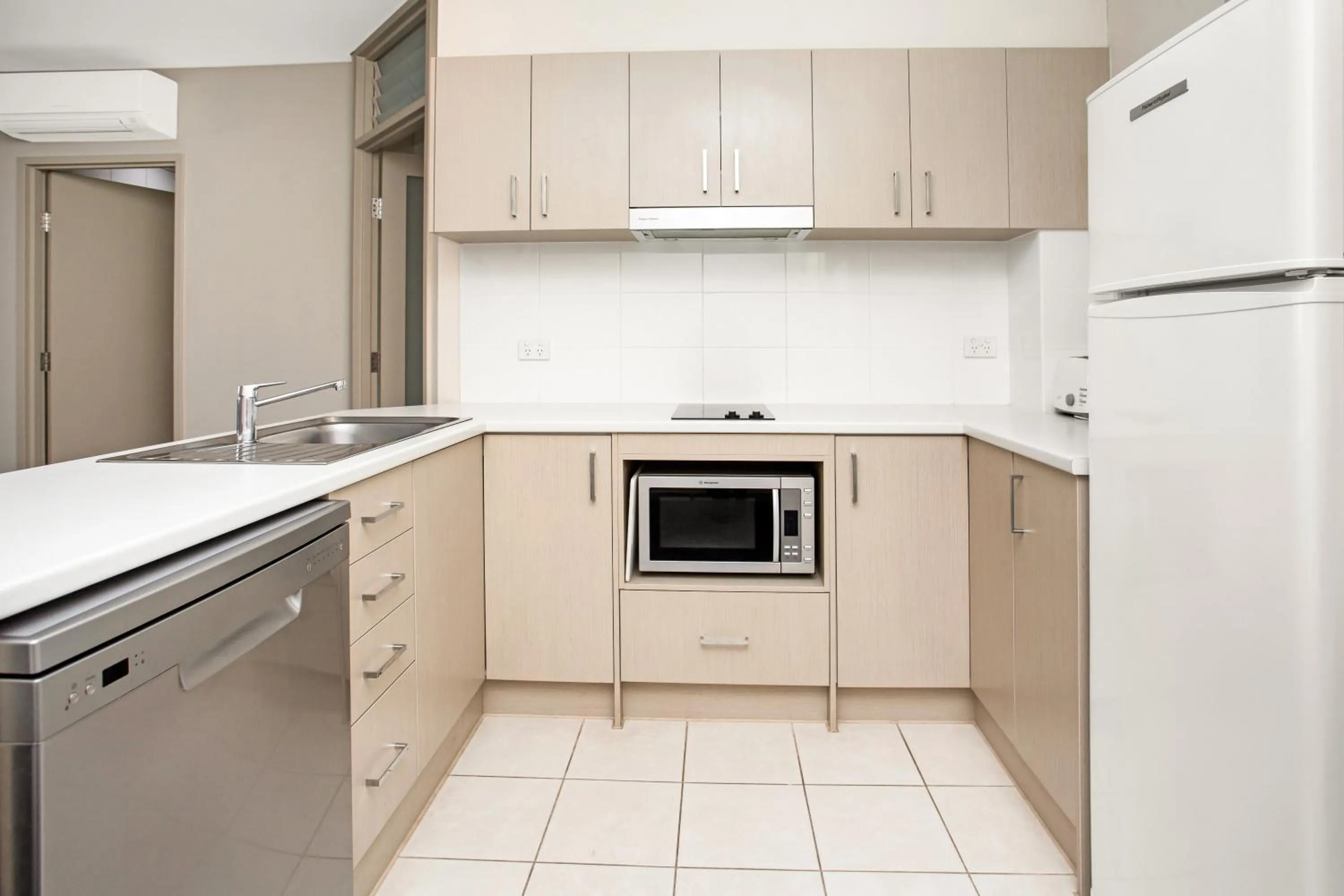 Kitchen or kitchenette in Hume Serviced Apartments
