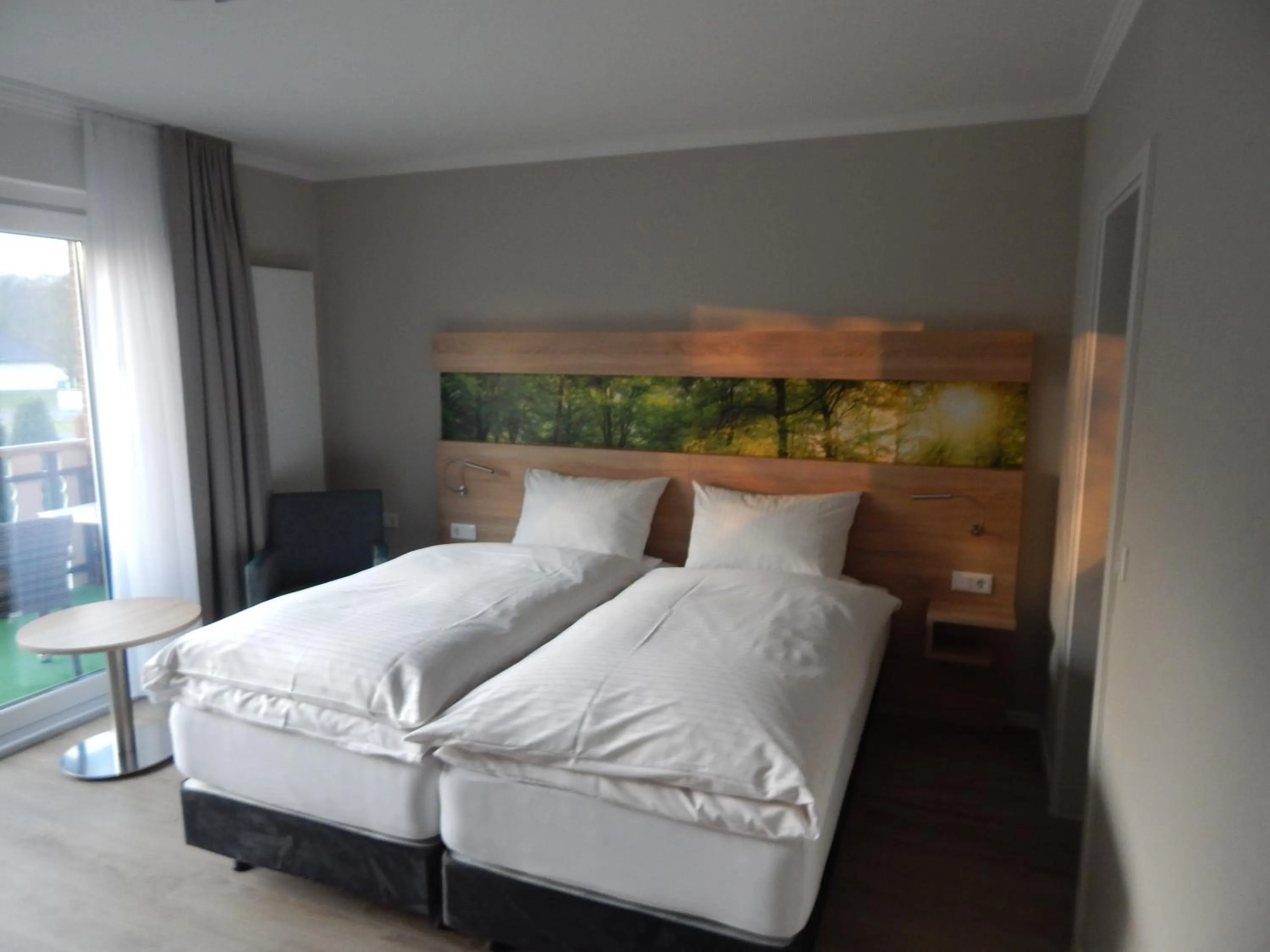 Photo of the whole room, Bed in Hotel garni Haaster Krug Otte