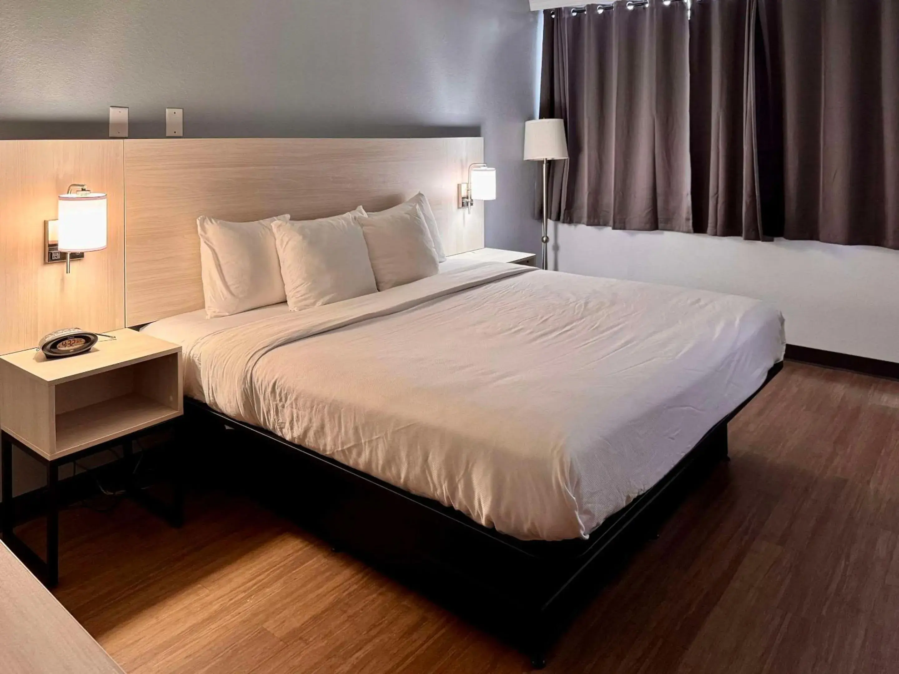 Bedroom, Bed in Suburban Studios East Syracuse Carrier Circle Bedroom, Bed in Suburban Studios East Syracuse Carrier Circle