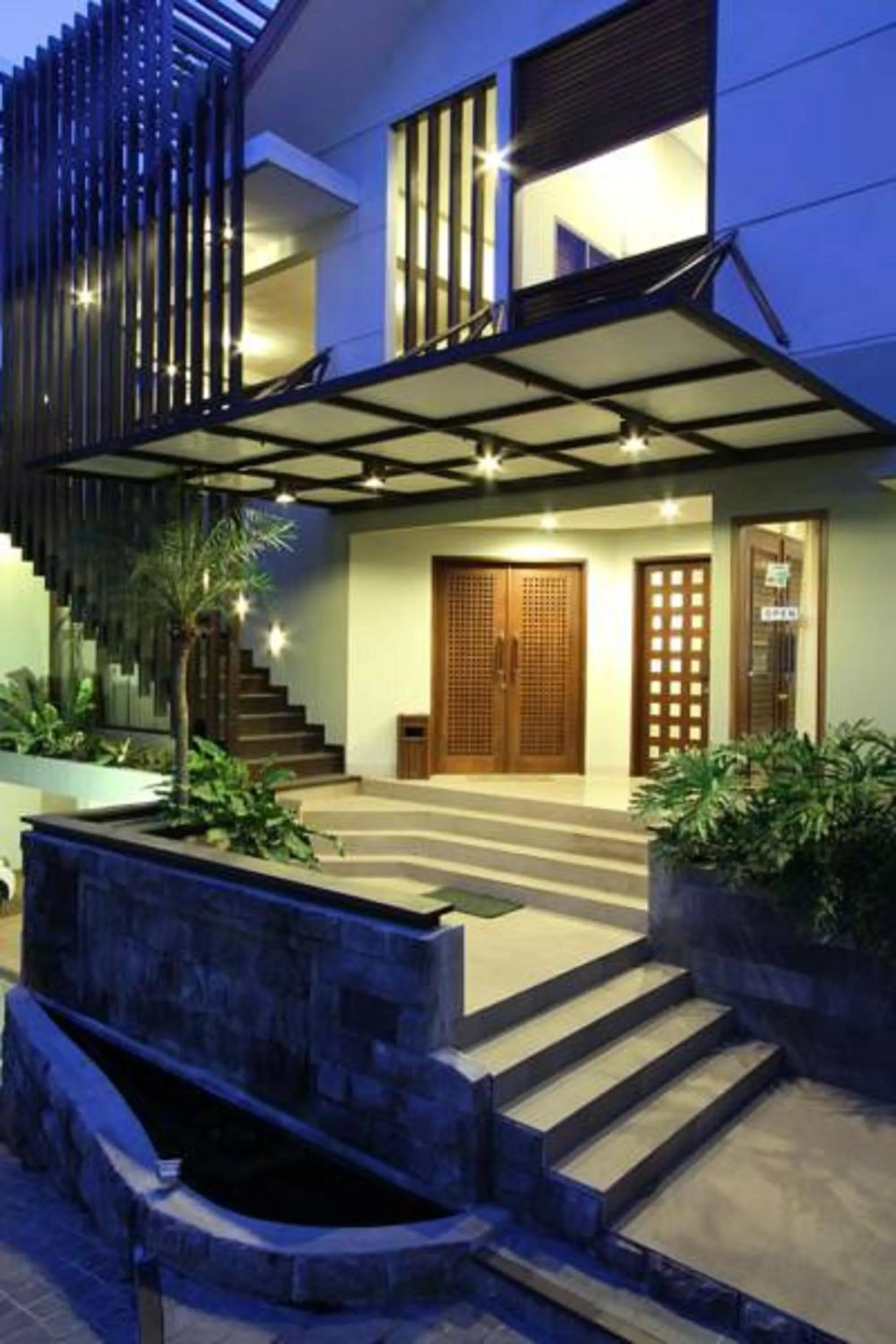 Facade/entrance in Java Go Residence by Jiwa Jawa