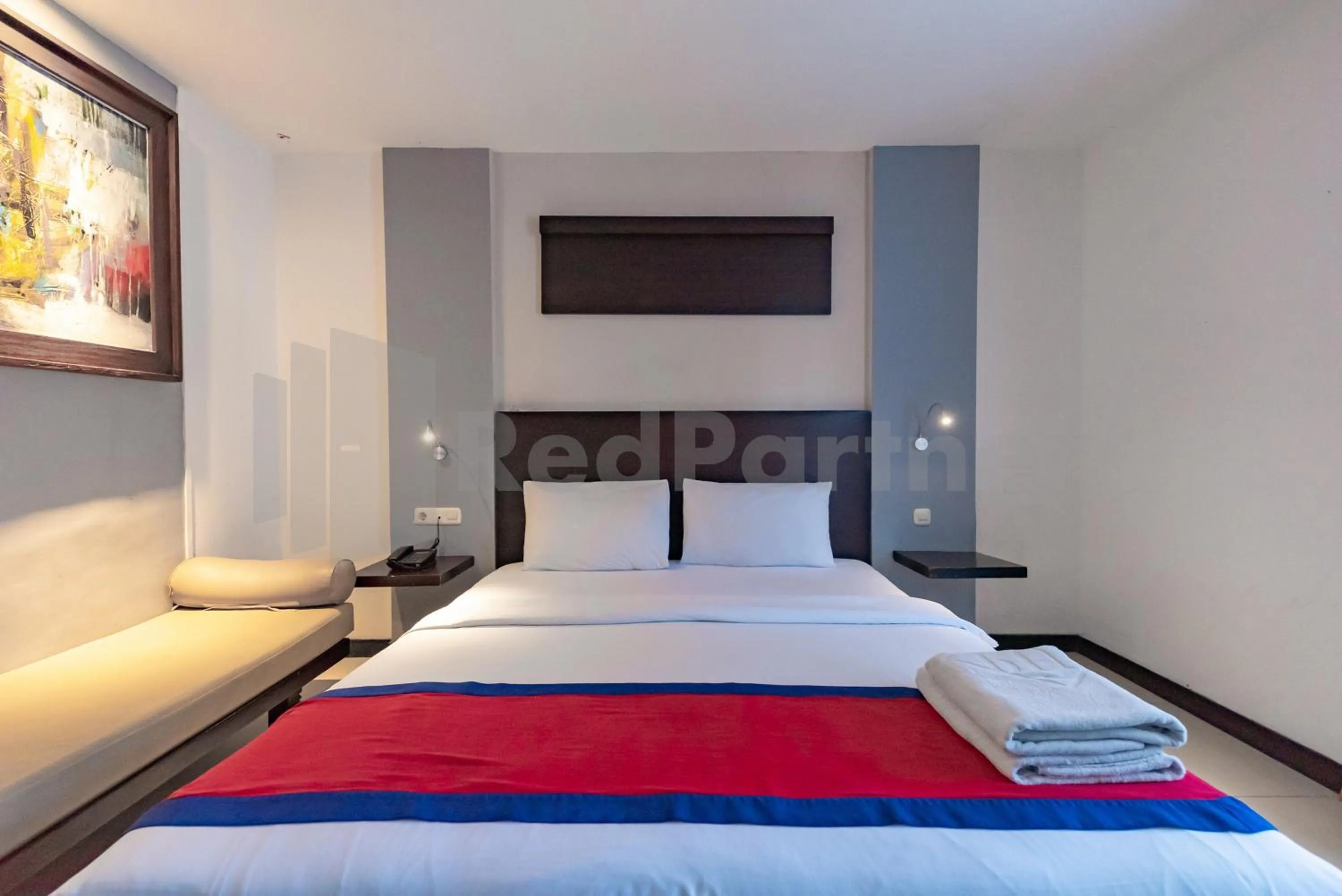 Bedroom, Bed in Ozz Hotel Kuta Bali manage by Ozz Group