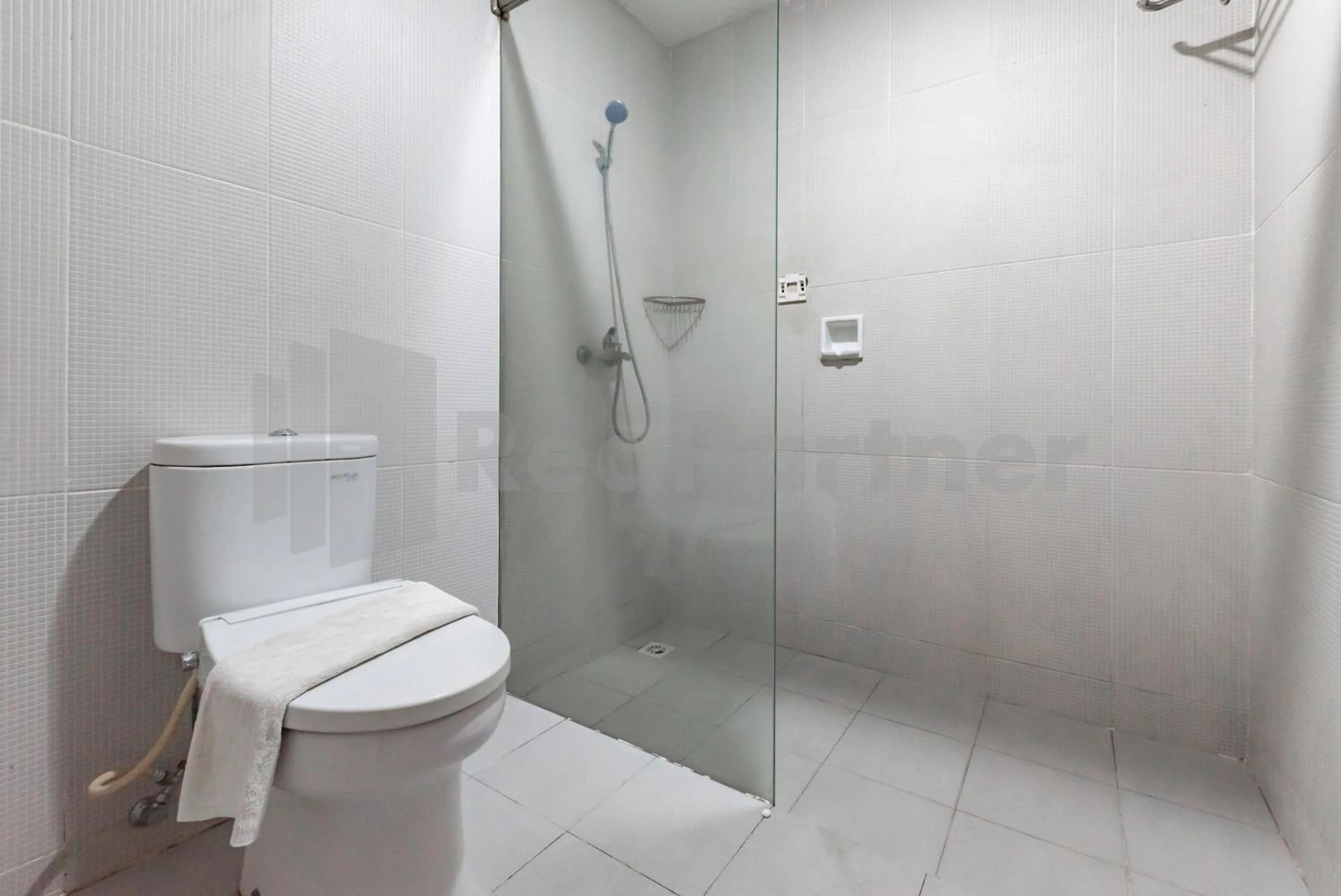 Bathroom in Ozz Hotel Kuta Bali manage by Ozz Group