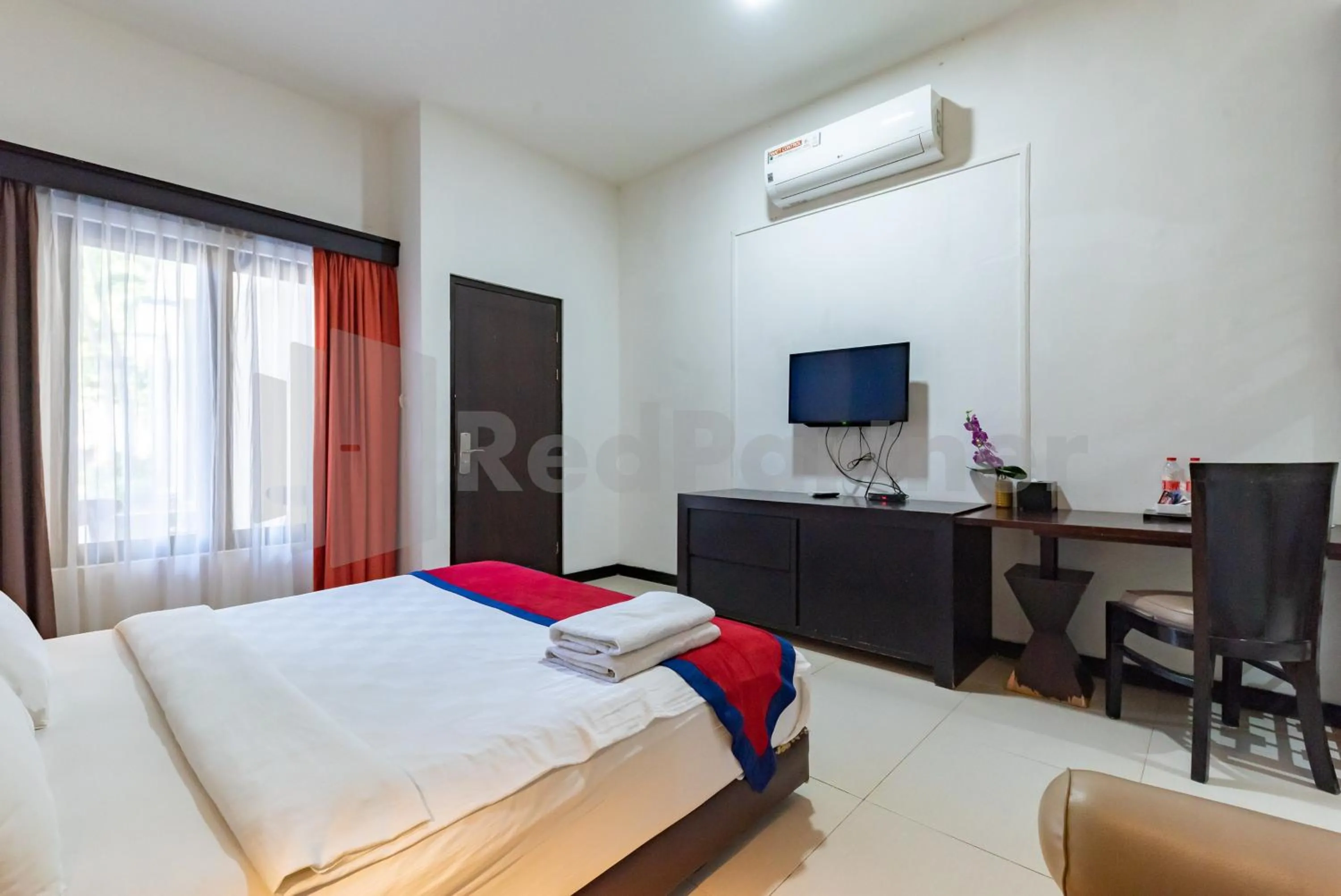 Bedroom, Bed in Ozz Hotel Kuta Bali manage by Ozz Group