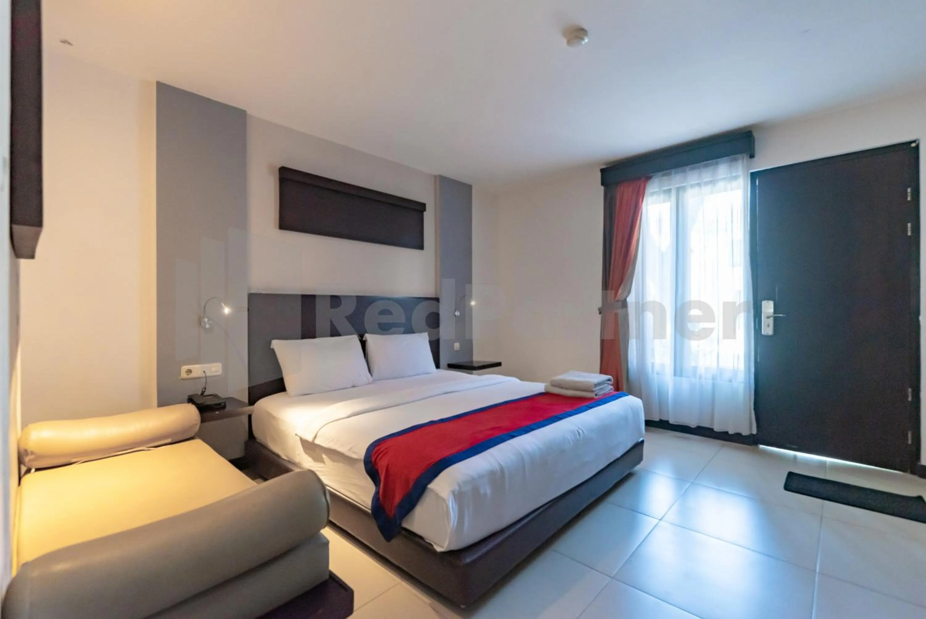 Bedroom, Bed in Ozz Hotel Kuta Bali manage by Ozz Group