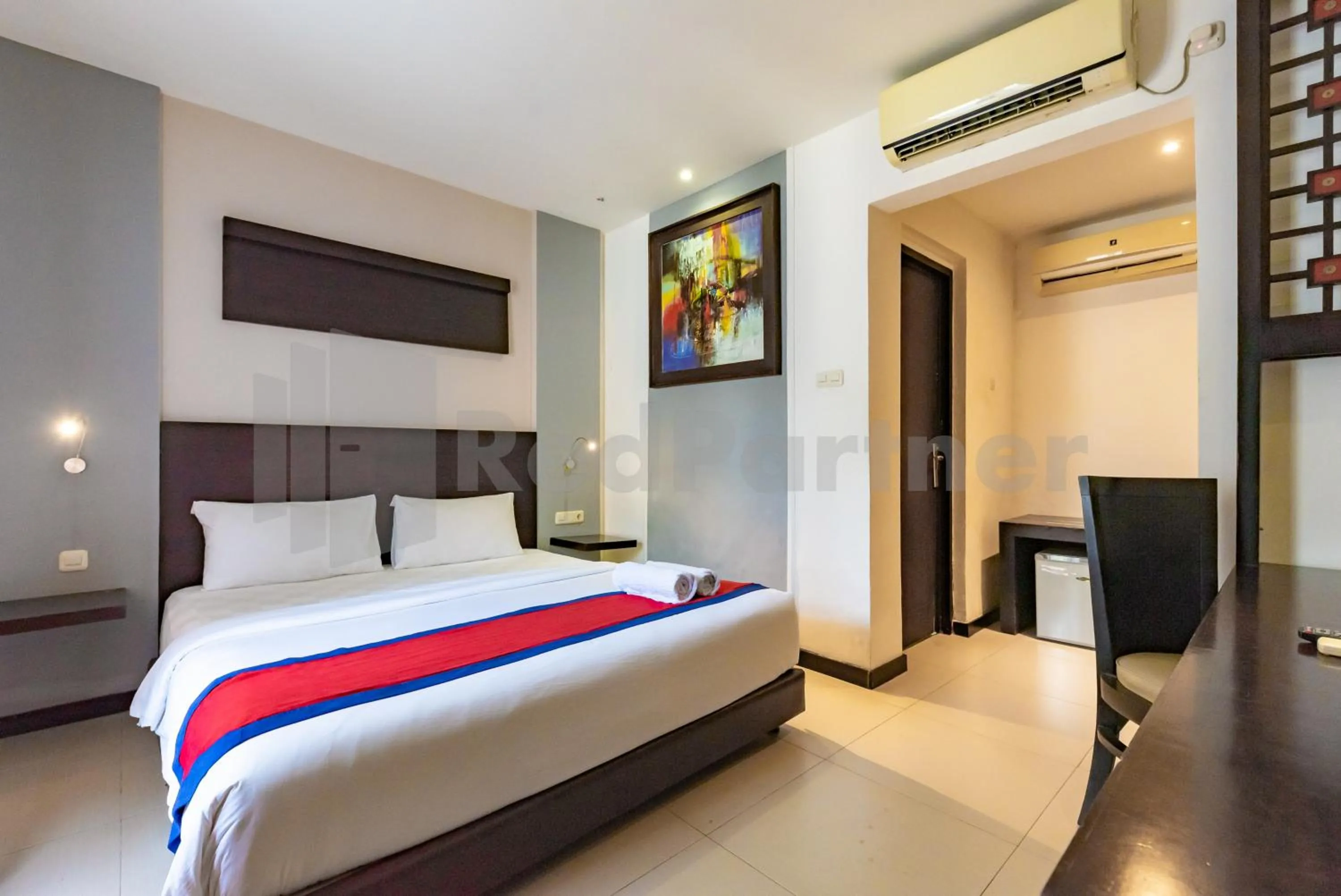 Bedroom, Bed in Ozz Hotel Kuta Bali manage by Ozz Group