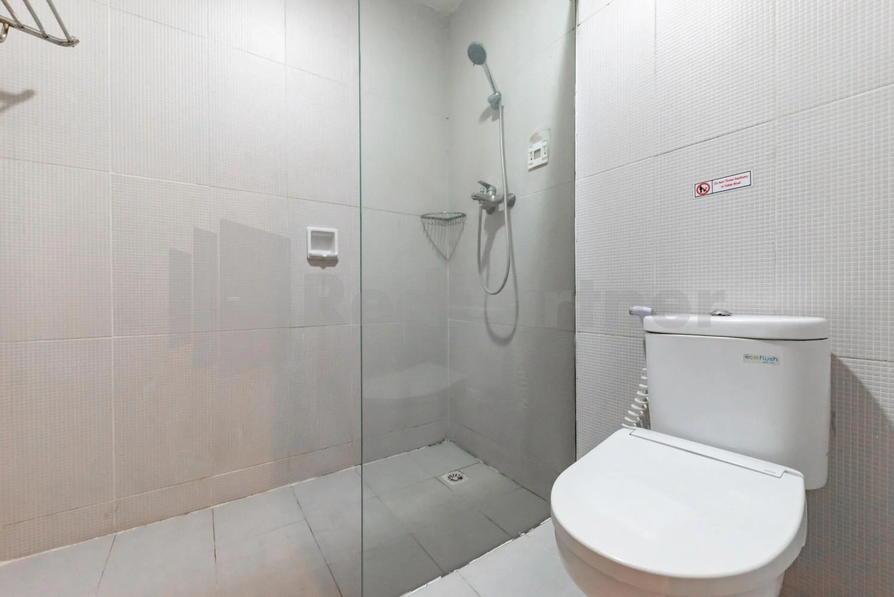 Bathroom in Ozz Hotel Kuta Bali manage by Ozz Group