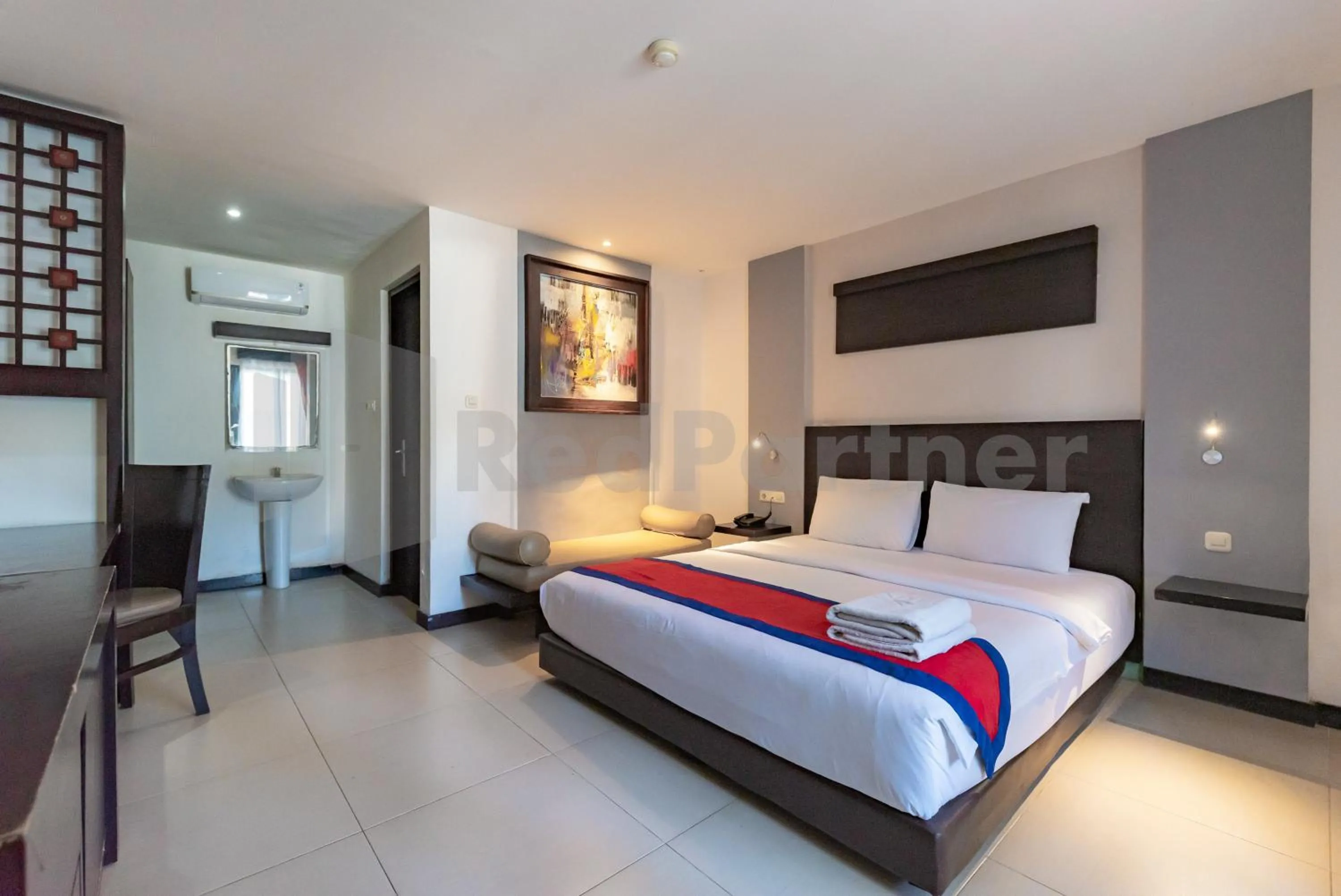 Bedroom, Bed in Ozz Hotel Kuta Bali manage by Ozz Group