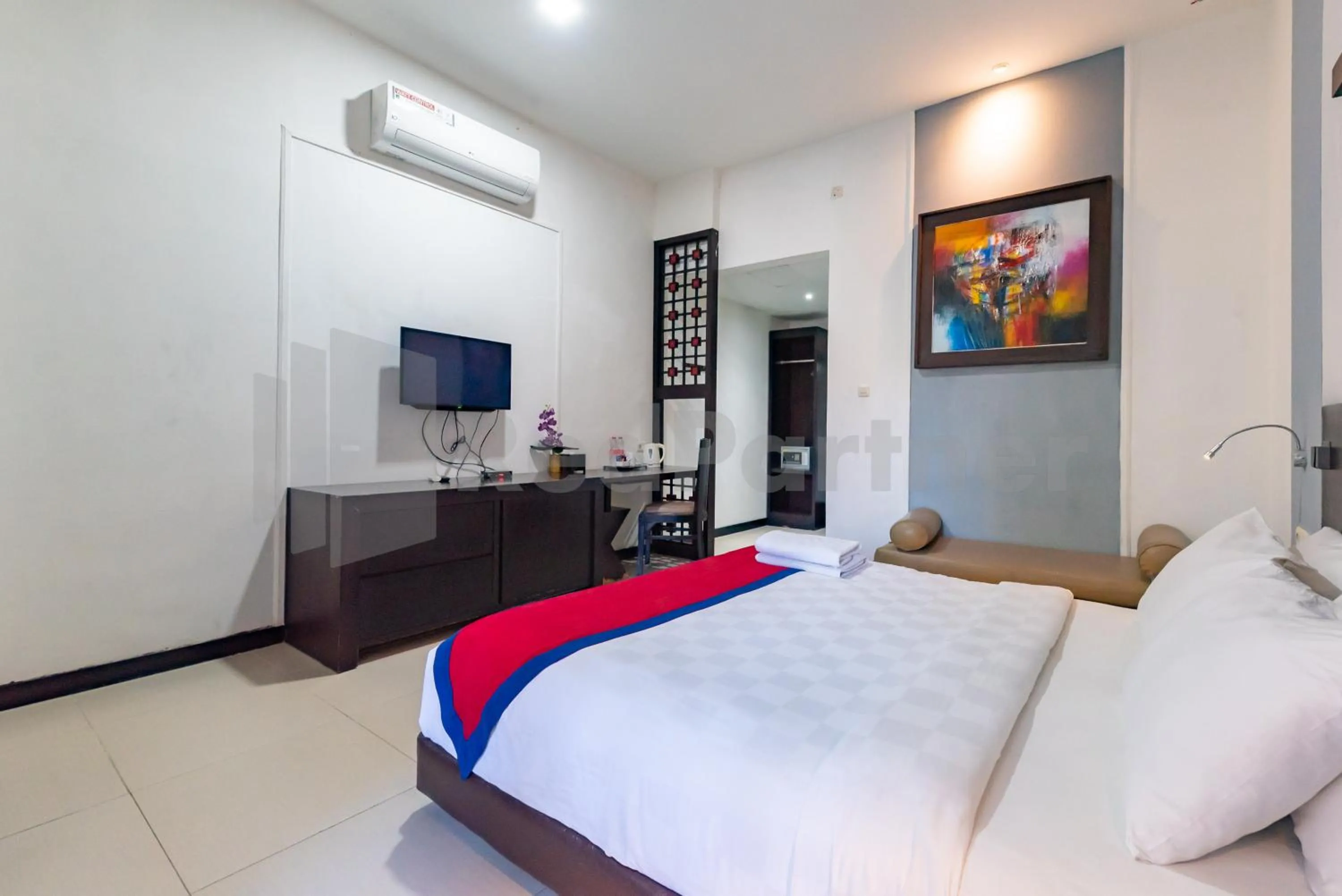 Bedroom, Bed in Ozz Hotel Kuta Bali manage by Ozz Group
