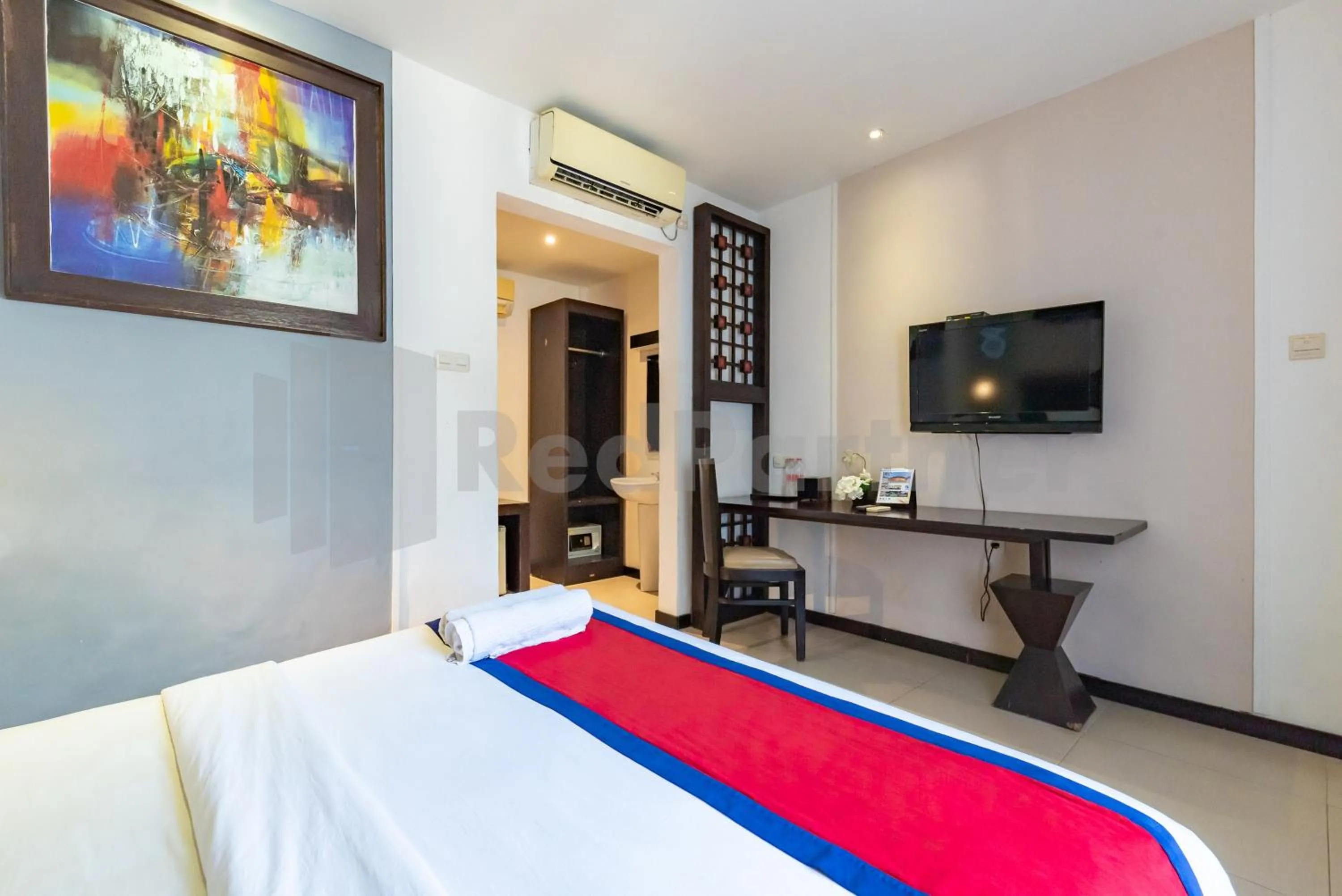 Bedroom, Bed in Ozz Hotel Kuta Bali manage by Ozz Group
