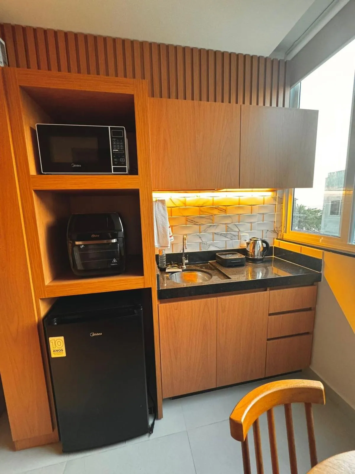 Kitchen or kitchenette in Flat Pé na Areia Iriri 204 - Seu refúgio na Praia