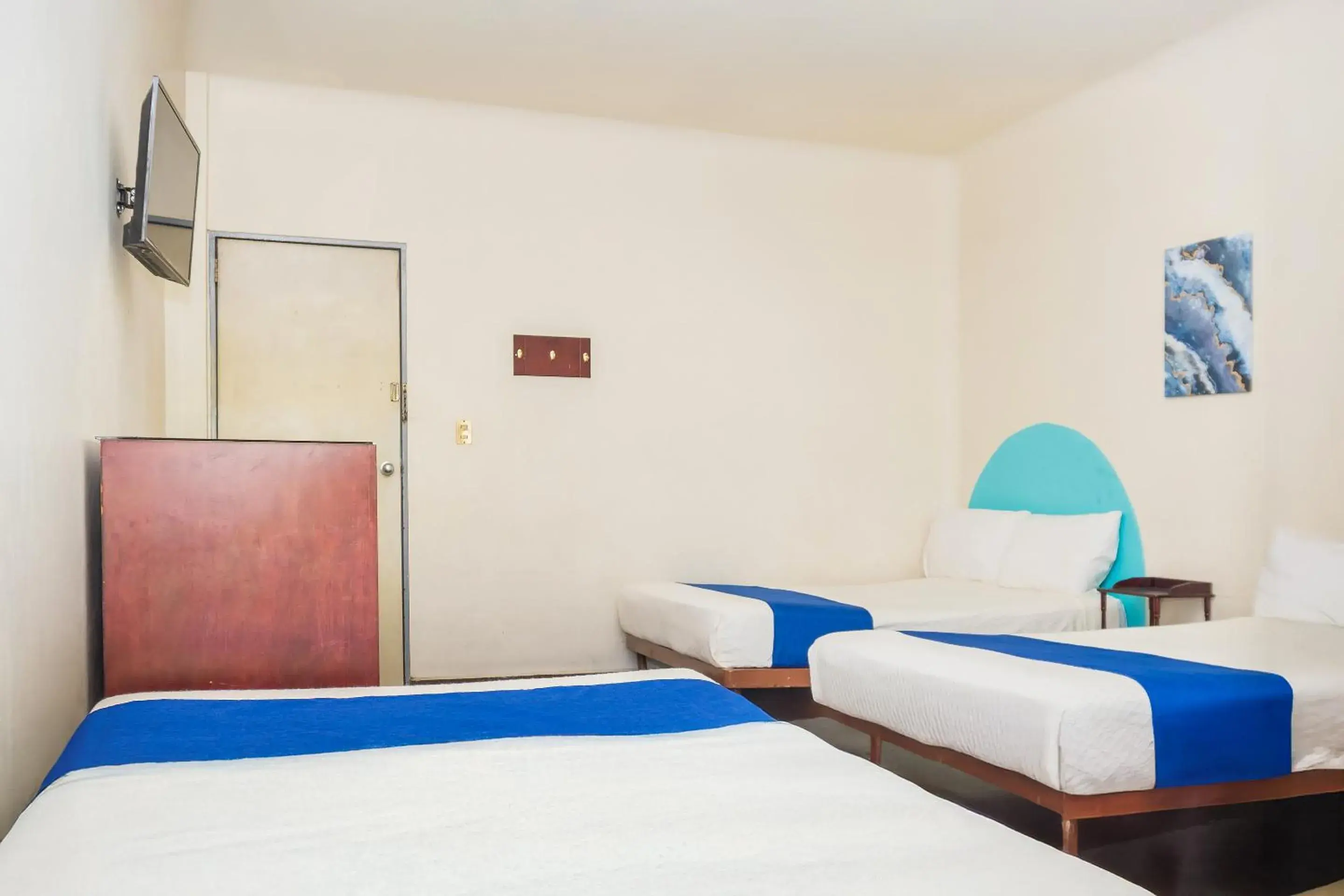 Bedroom, Bed in Capital O Nueva York, Guadalajara centro downtown Bedroom, Bed in Capital O Nueva York, Guadalajara centro downtown