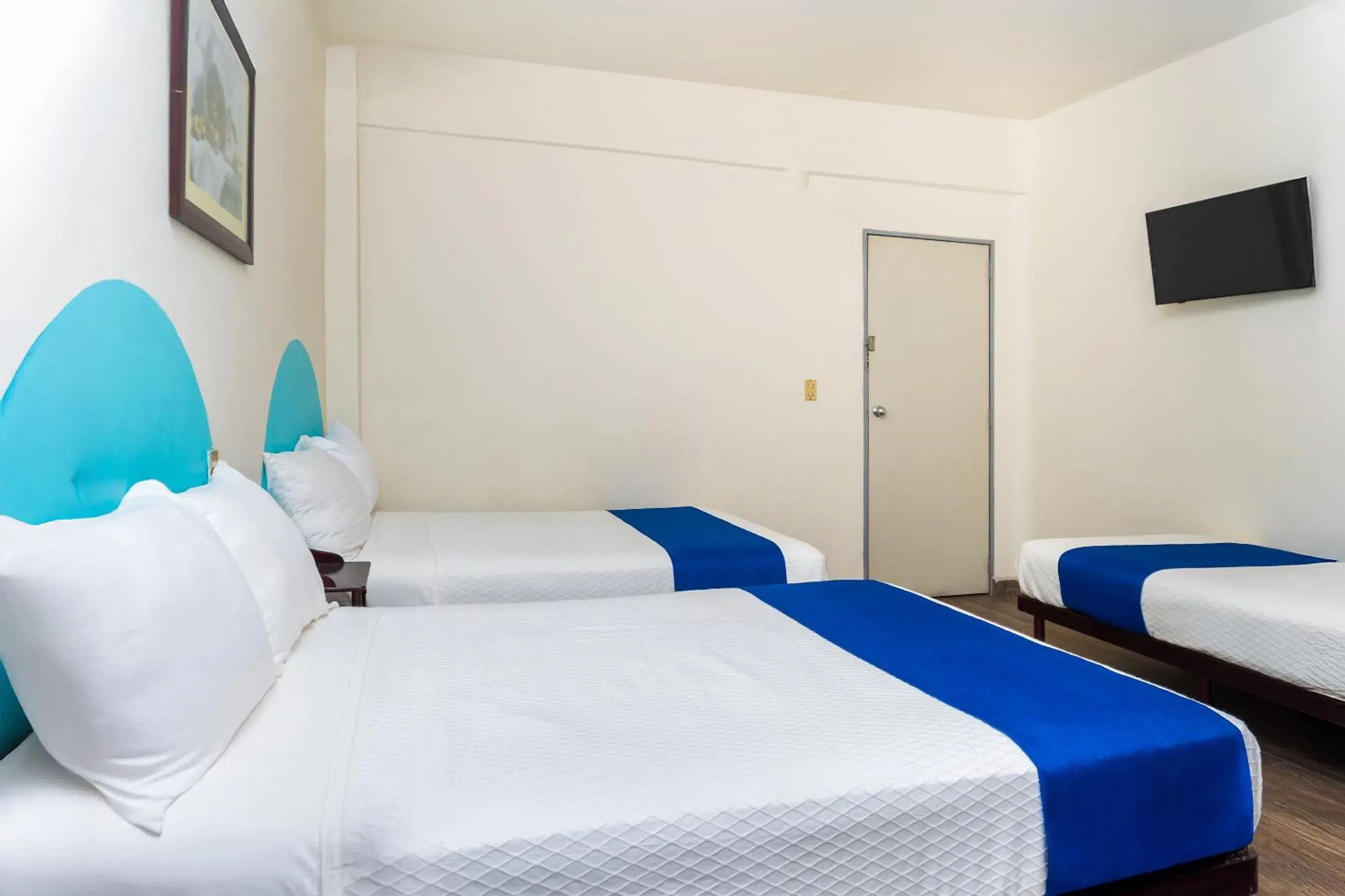 Bedroom, Bed in Capital O Nueva York, Guadalajara centro downtown Bedroom, Bed in Capital O Nueva York, Guadalajara centro downtown