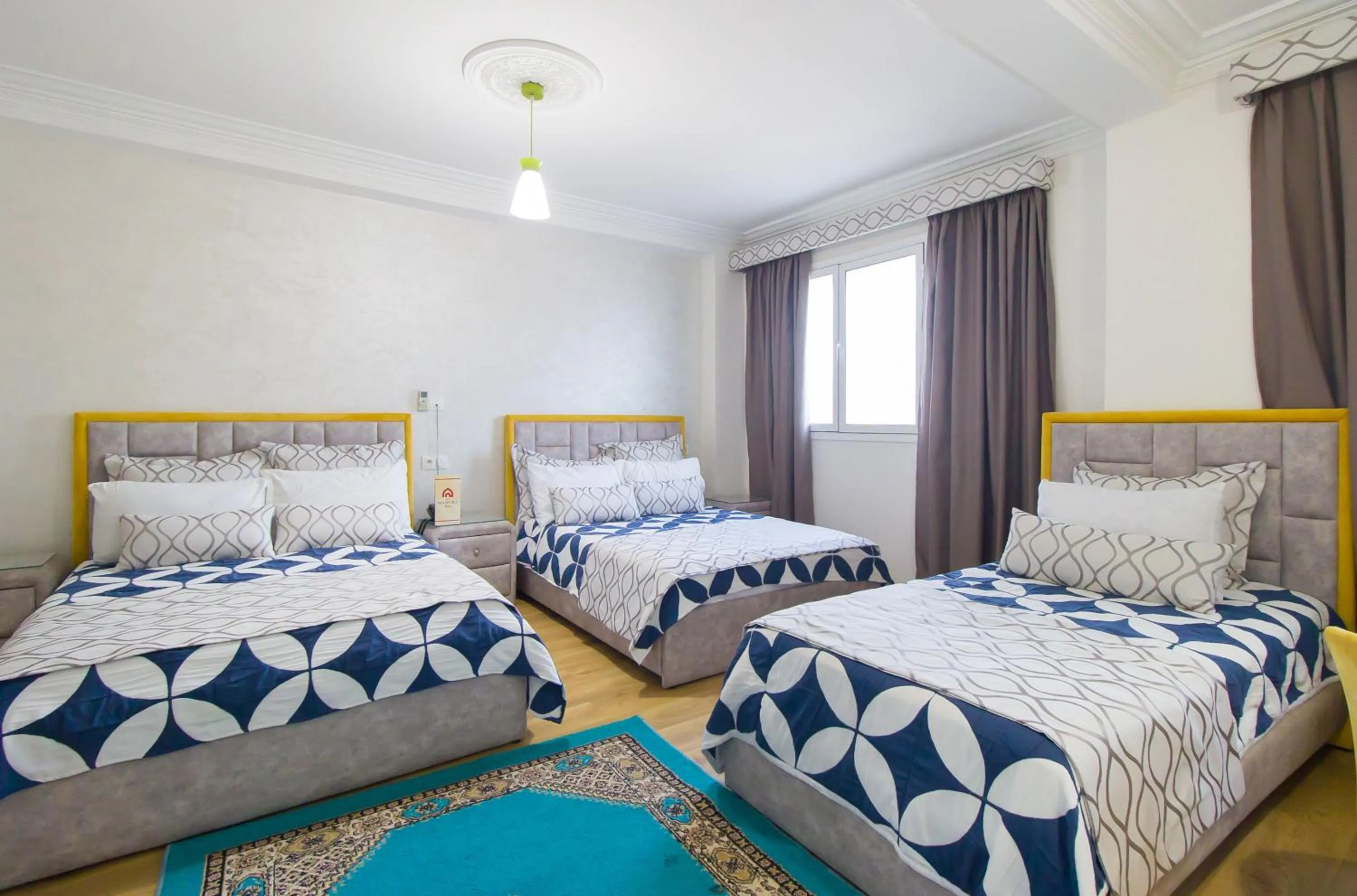 Photo of the whole room, Bed in Mamora Bay