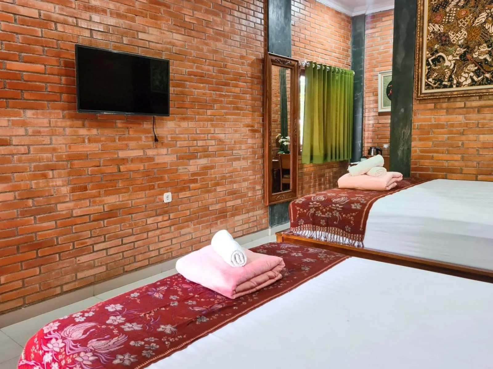 Photo of the whole room, Bed in Ndalem Suryo Saptono Guest House