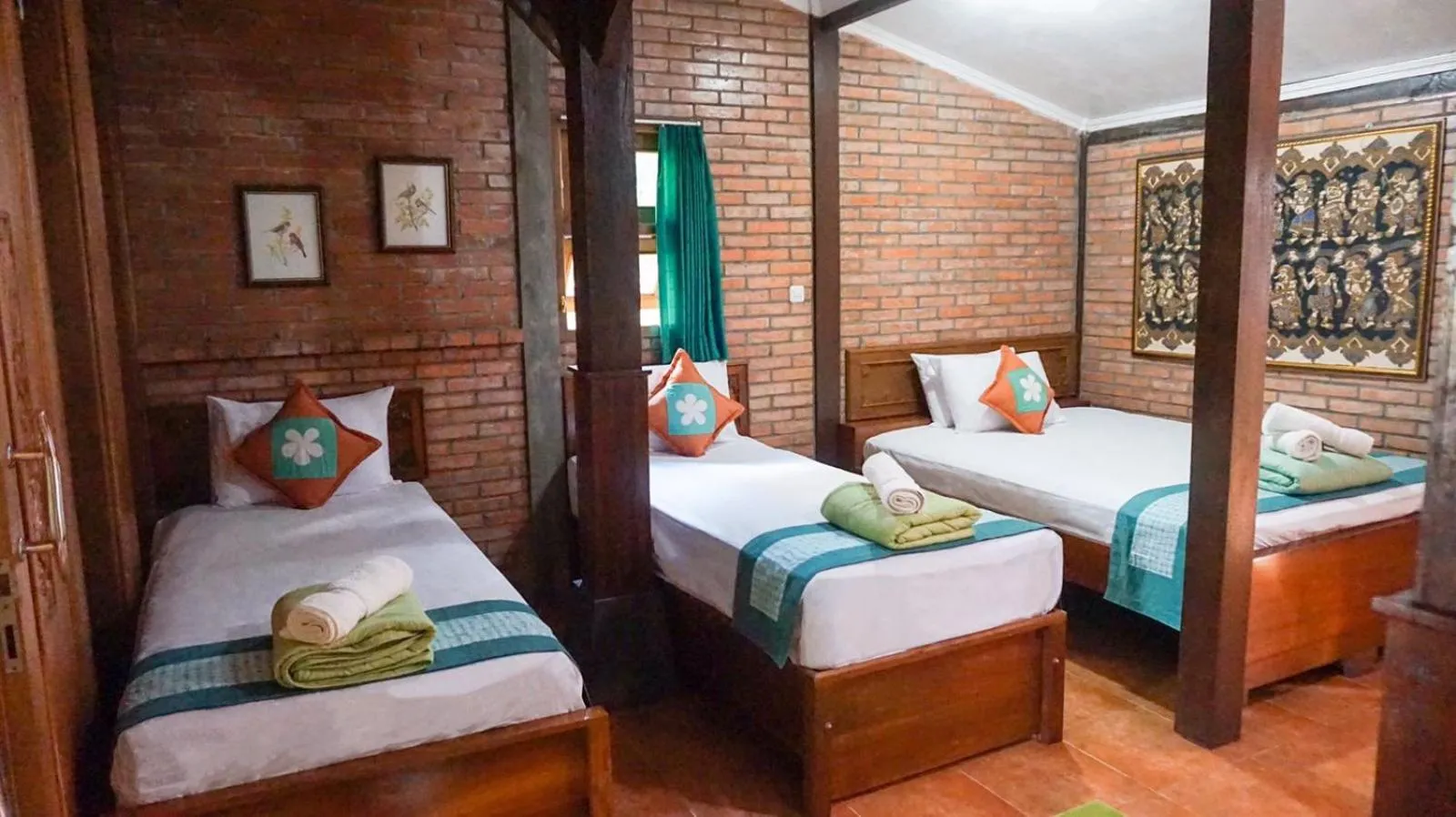 Bed in Ndalem Suryo Saptono Guest House
