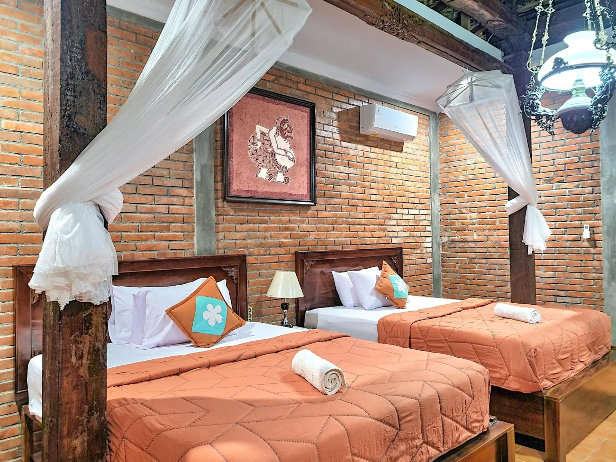 Bed in Ndalem Suryo Saptono Guest House