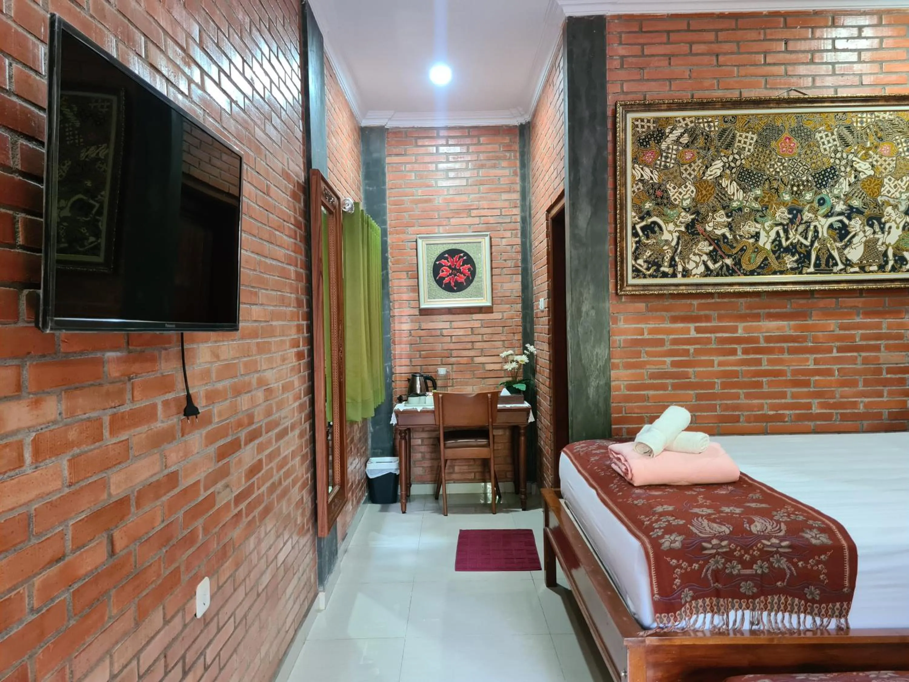 Photo of the whole room, Bed in Ndalem Suryo Saptono Guest House