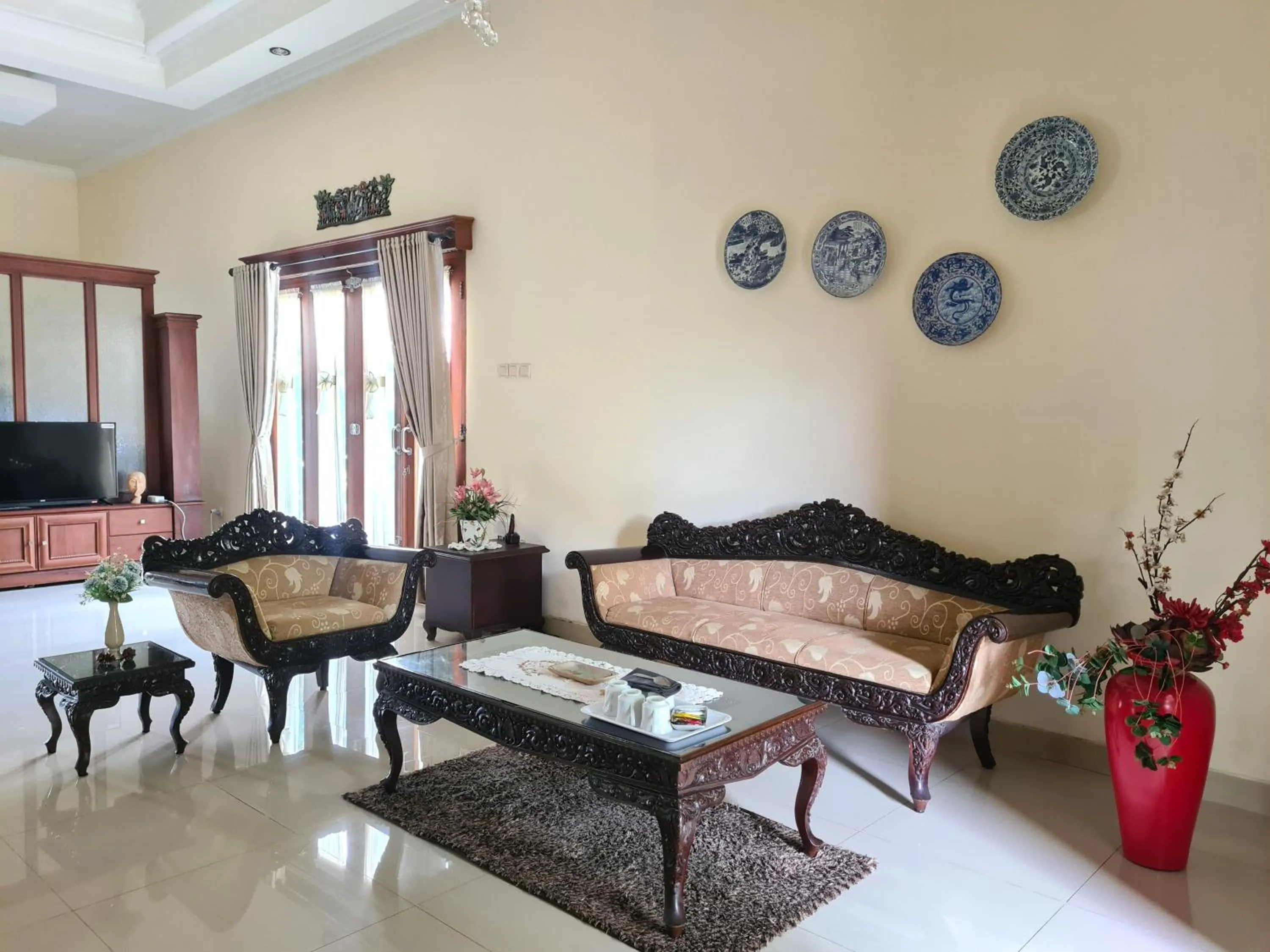 Seating area in Ndalem Suryo Saptono Guest House