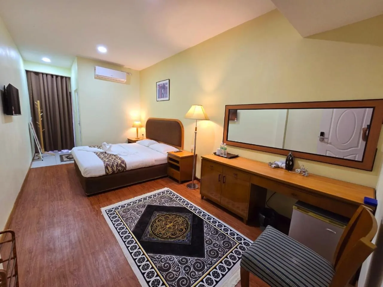 Bed in Grand Luxury Hotel Semporna