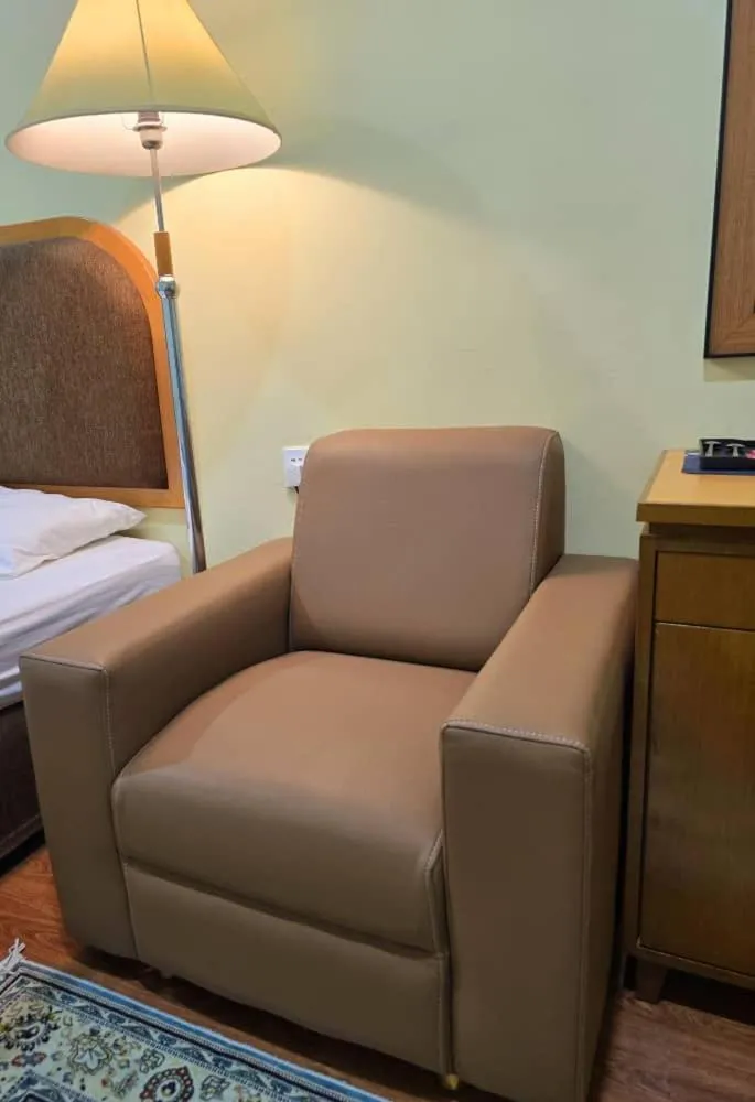 Seating area, Bed in Grand Luxury Hotel Semporna
