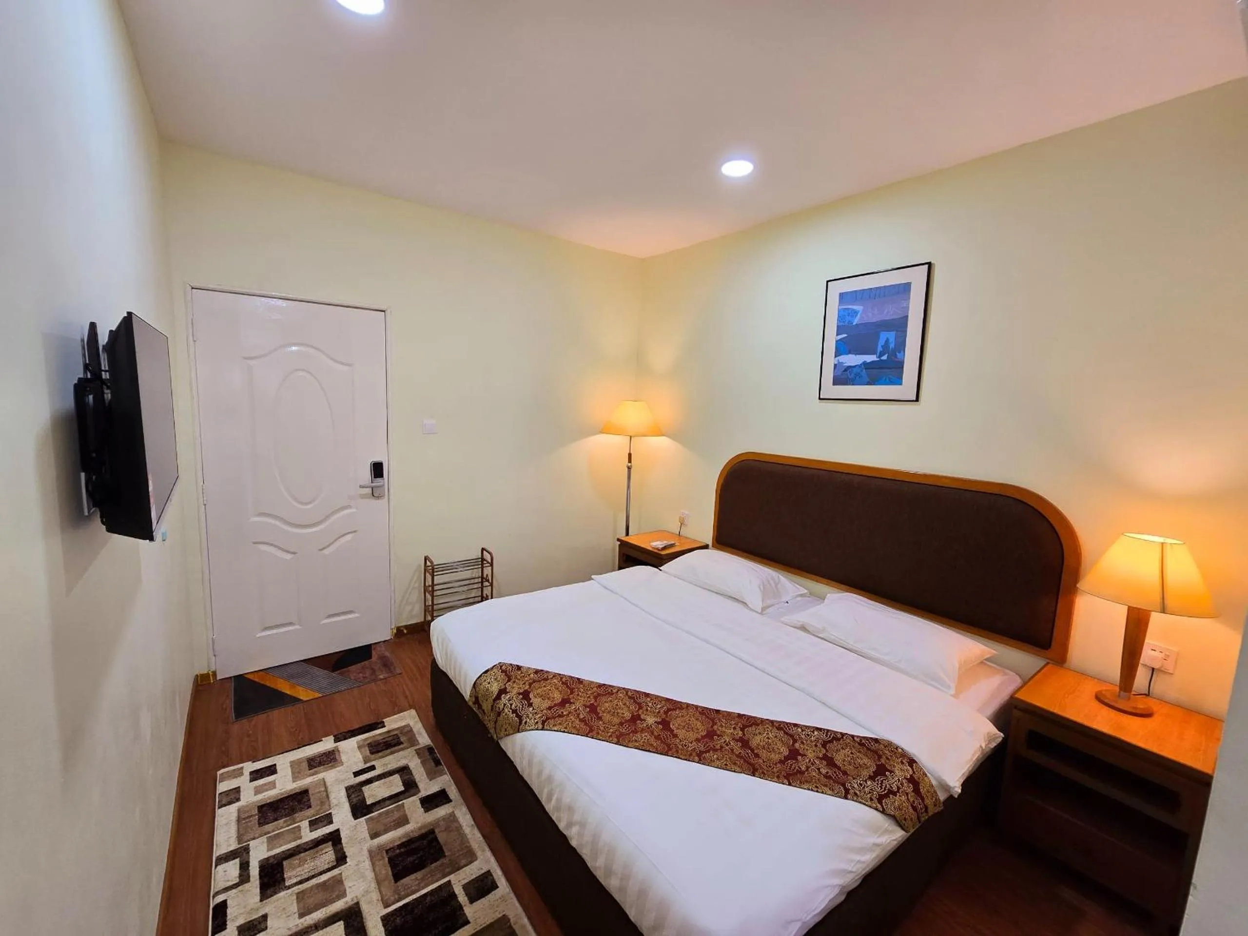 Bed in Grand Luxury Hotel Semporna