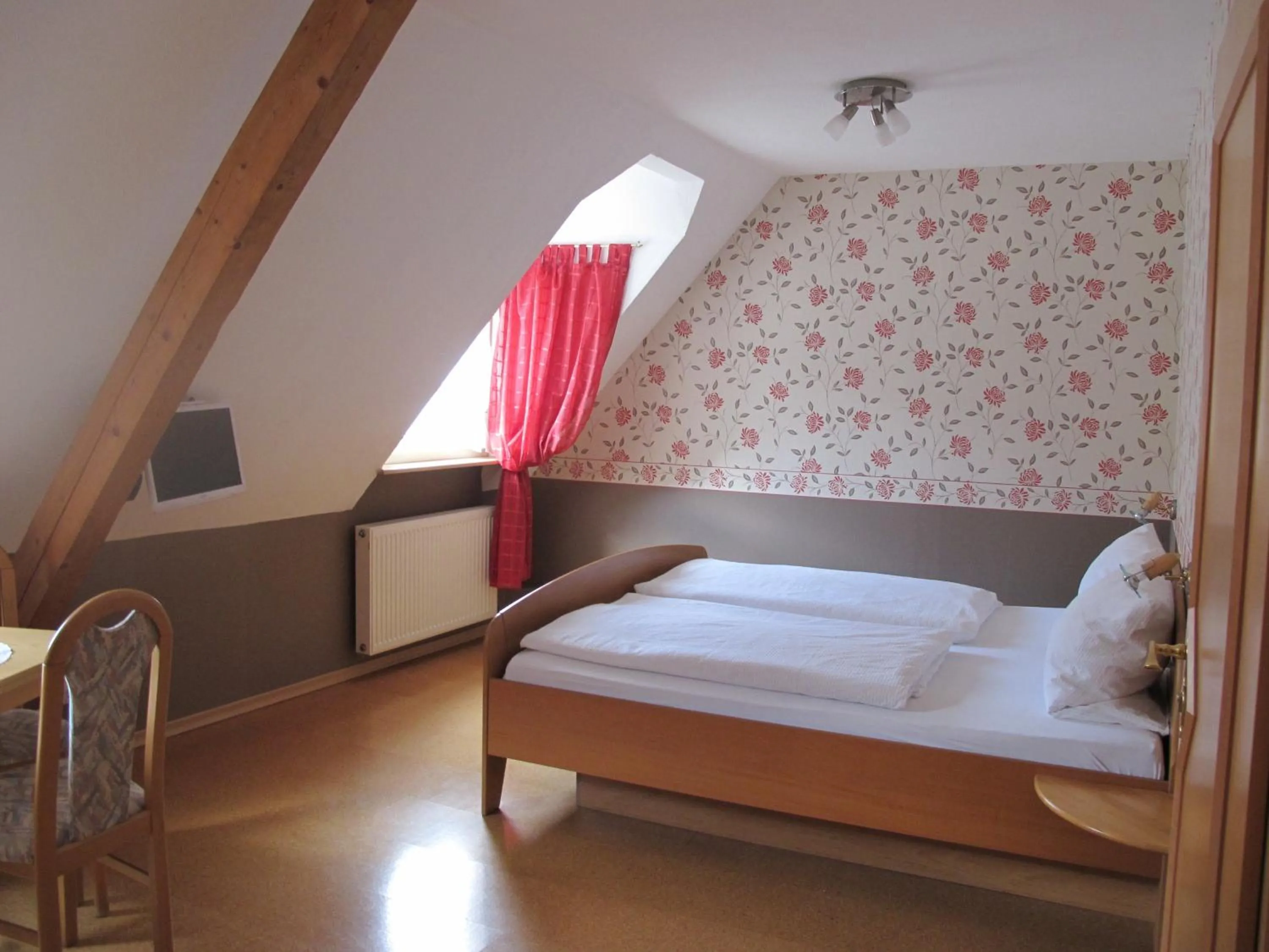 Photo of the whole room, Bed in Weinhof Michael Morbach