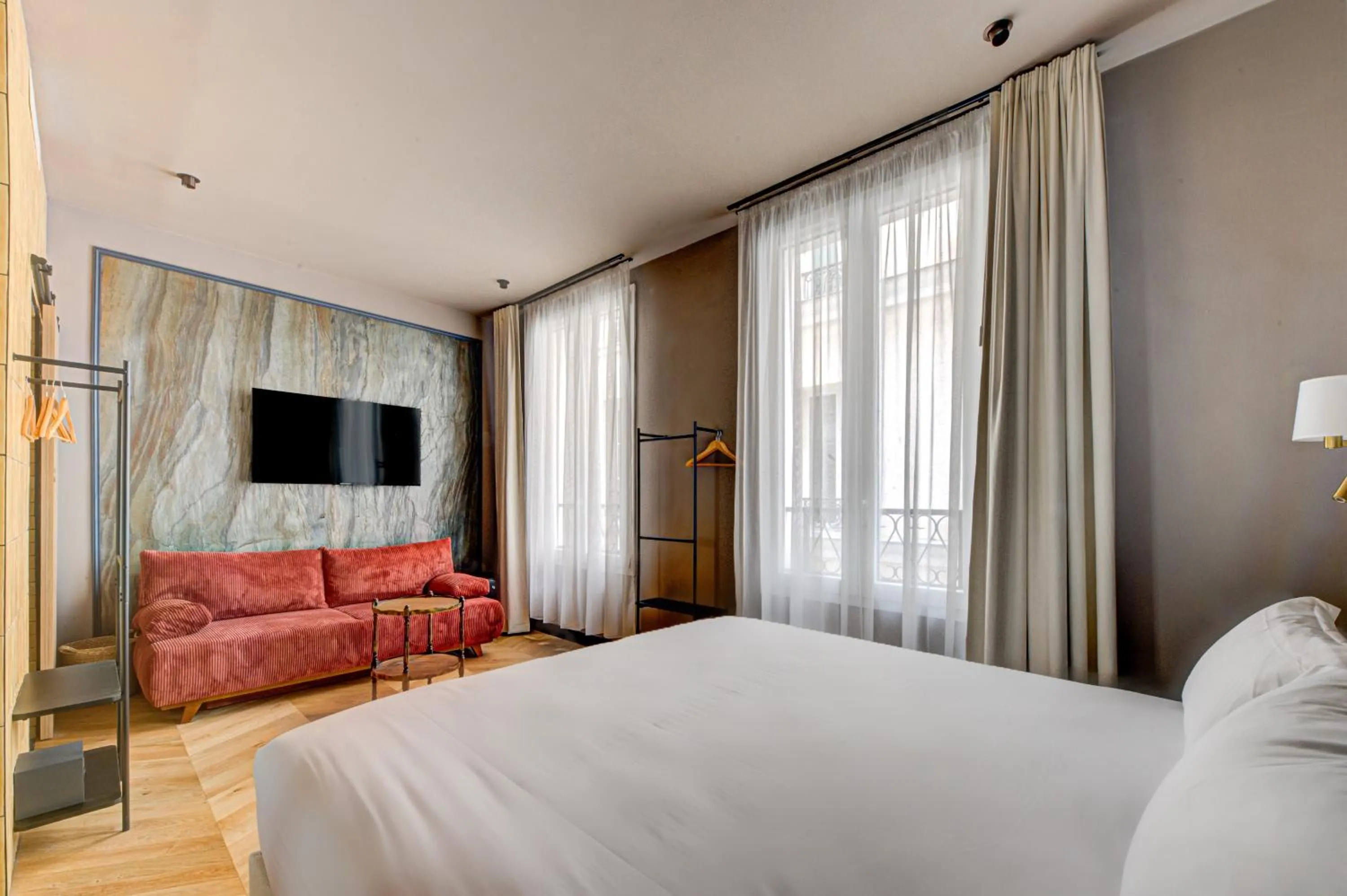 Photo of the whole room, Bed in Hôtel Maât Batignolles