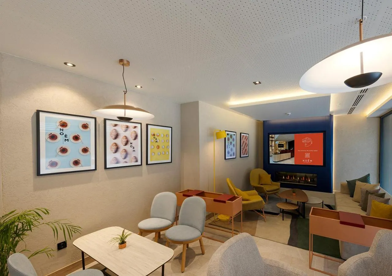 Seating area in Noém Hotel