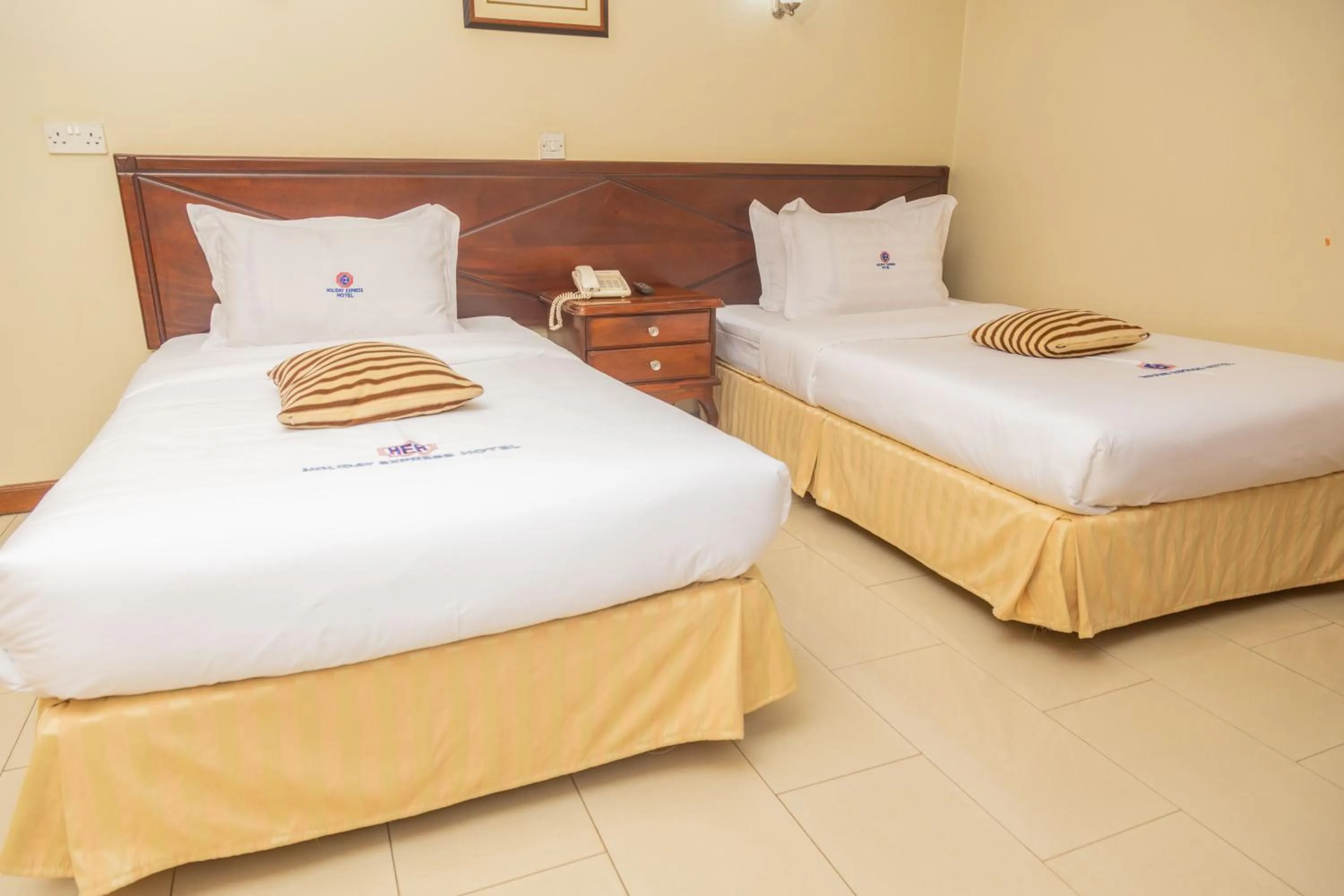 Bed in Holiday Express Hotel Kampala