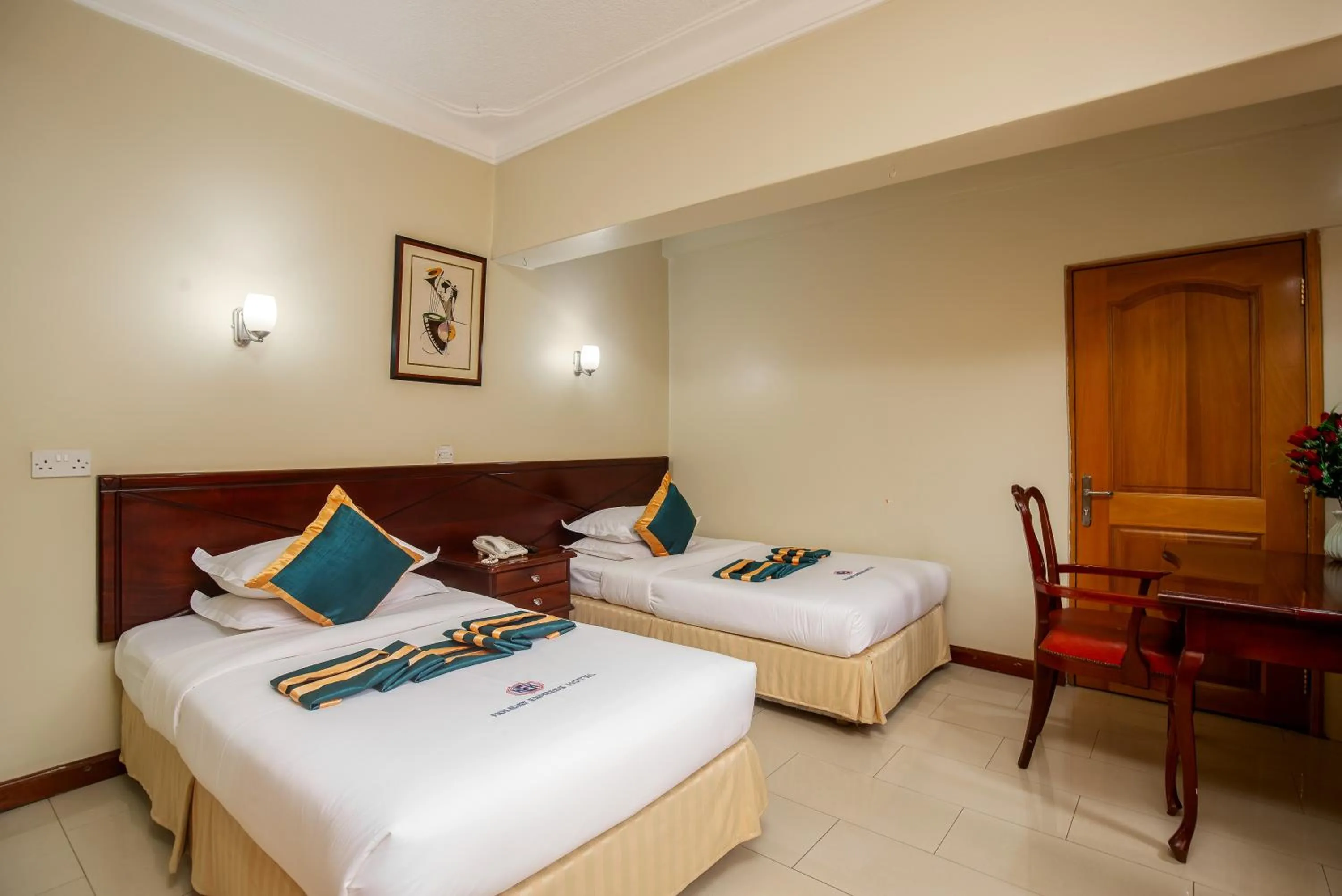 Bed in Holiday Express Hotel Kampala