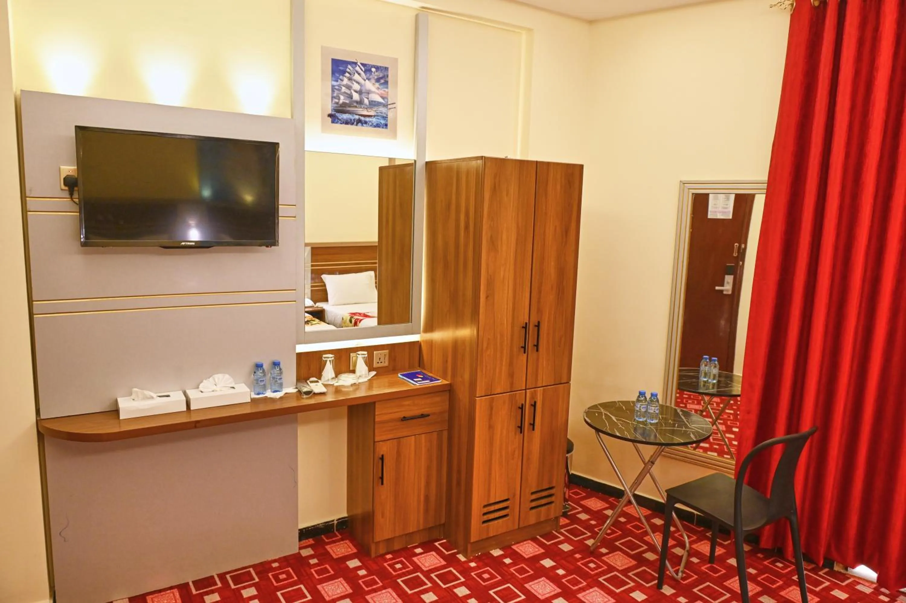 TV and multimedia in Tanha Palace Hotel