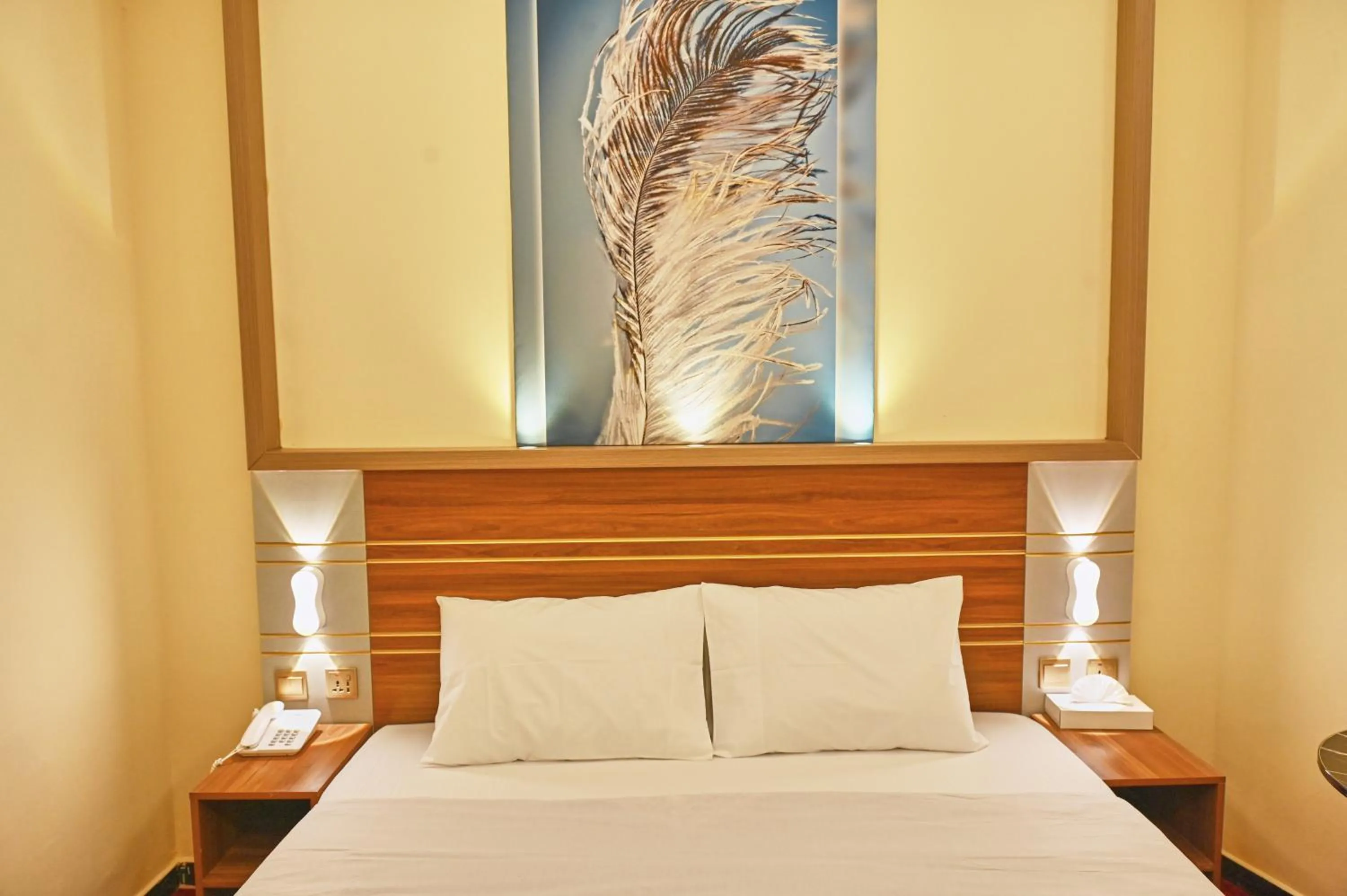 Bed in Tanha Palace Hotel