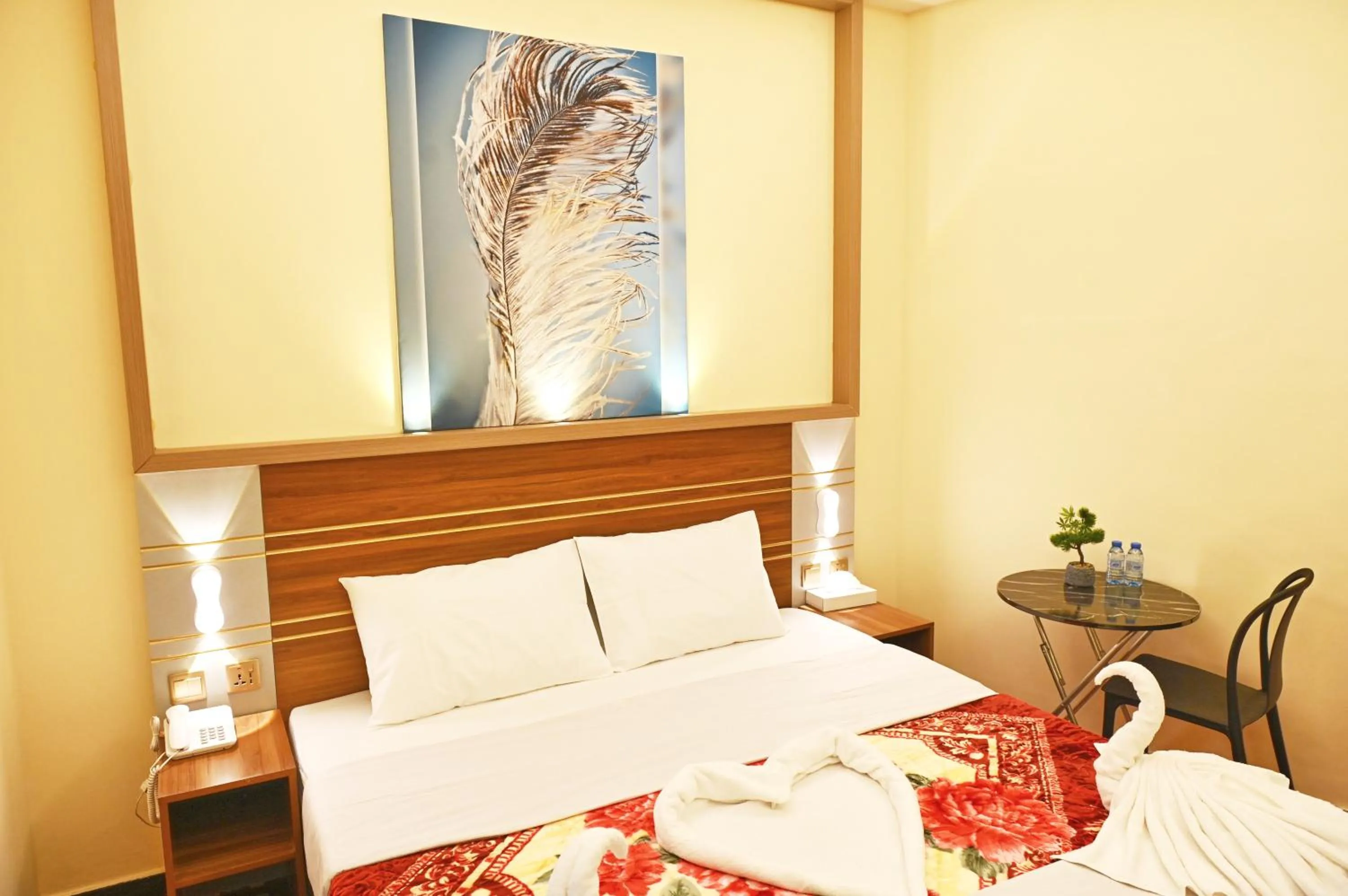 Bed in Tanha Palace Hotel