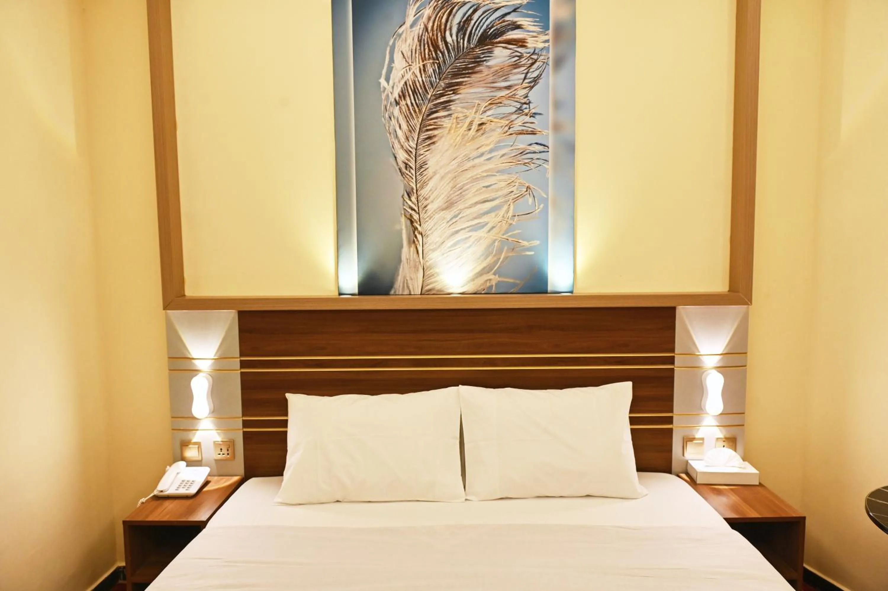 Bed in Tanha Palace Hotel