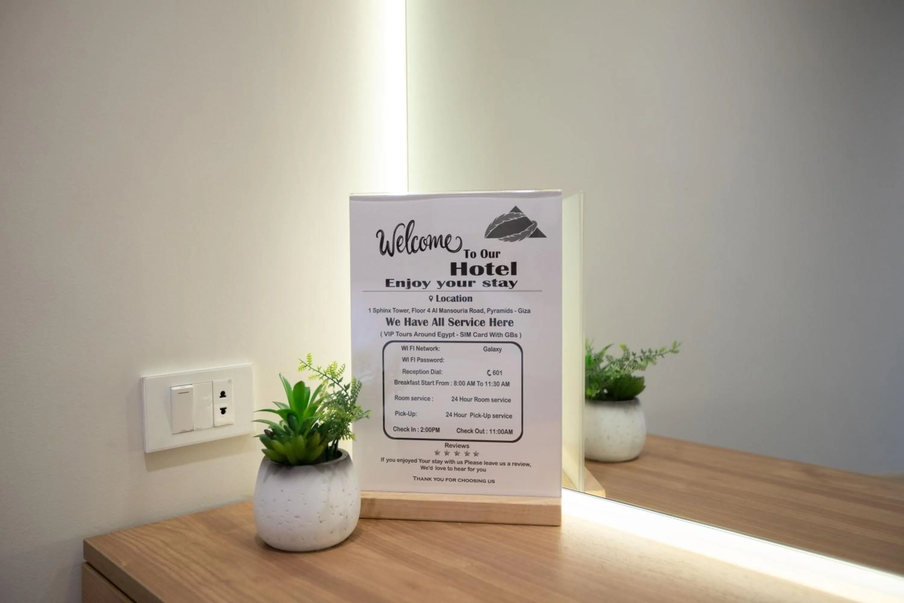 Property logo or sign in Galaxy Pyramids View INN