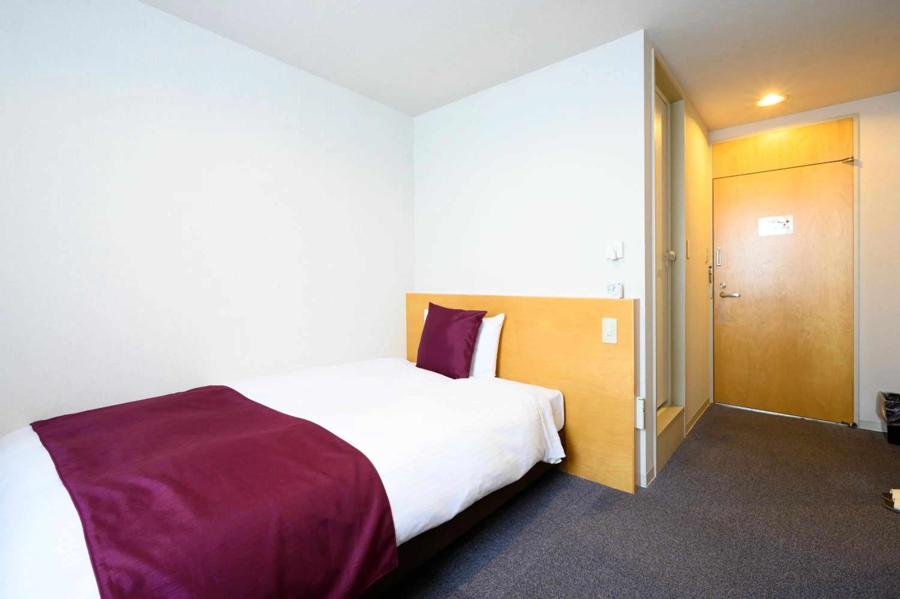 Bed in hotel miura kaen