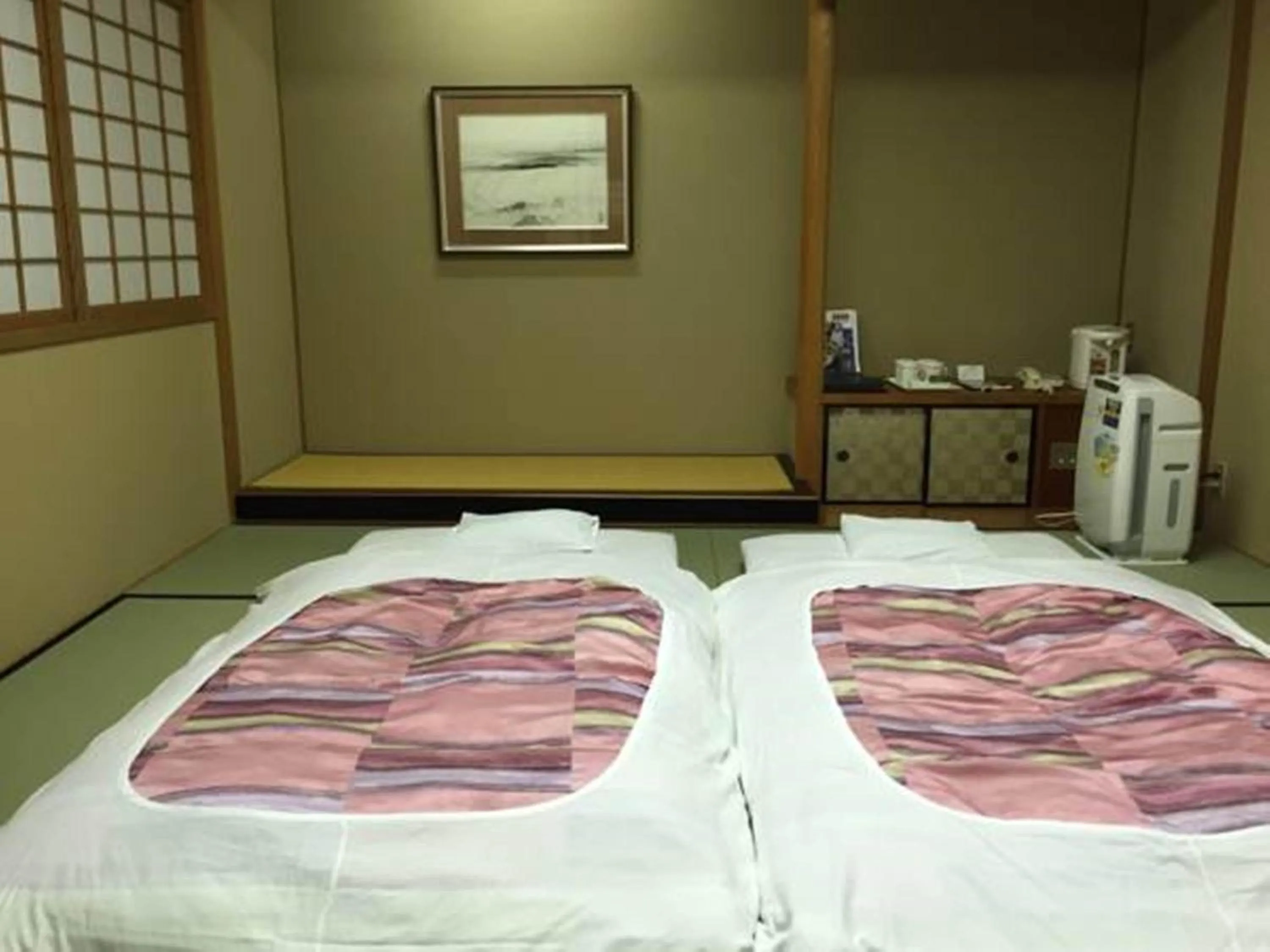 Bed in Hotel New Omi