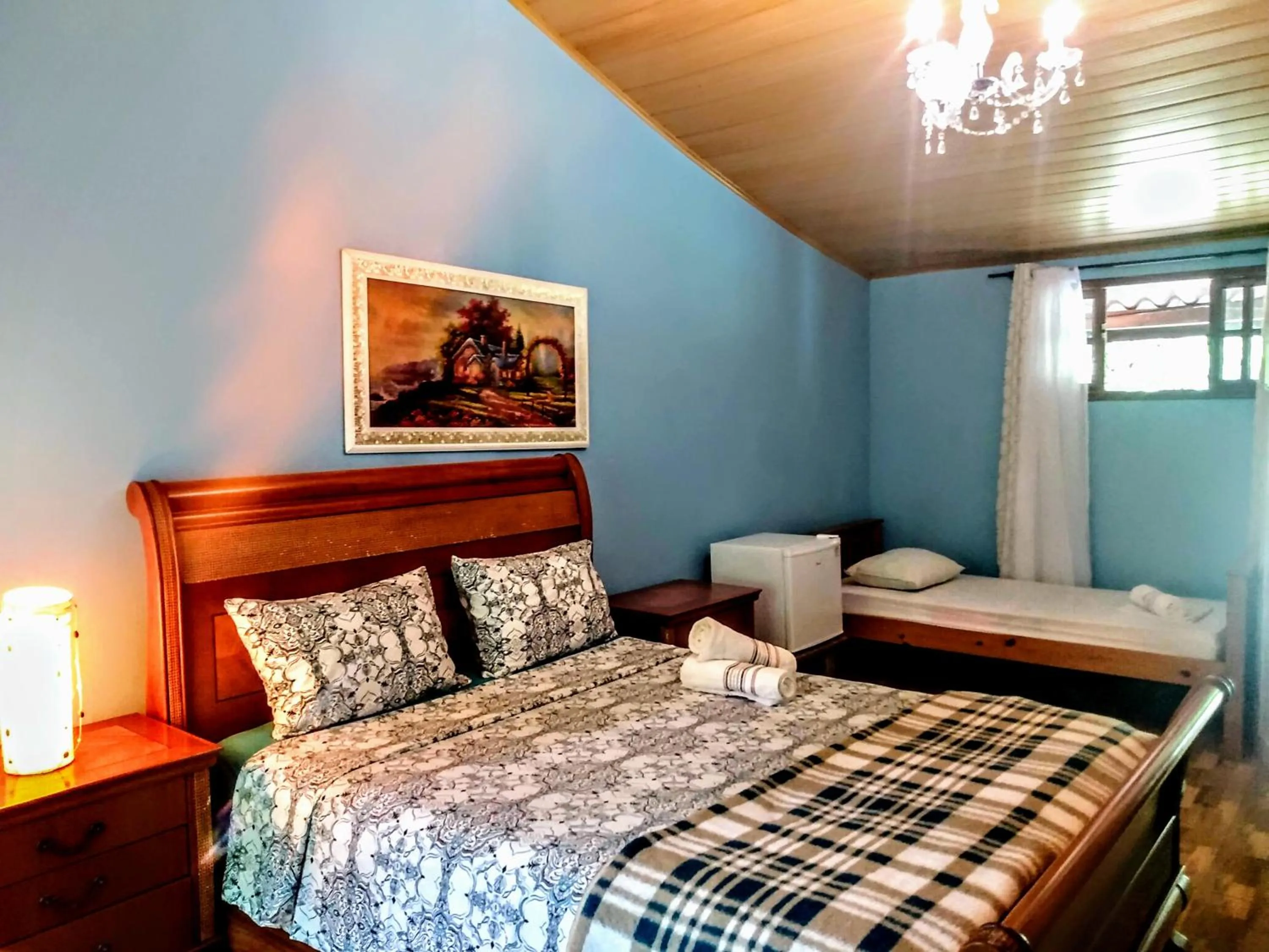 Bed in Pousada Lisieux